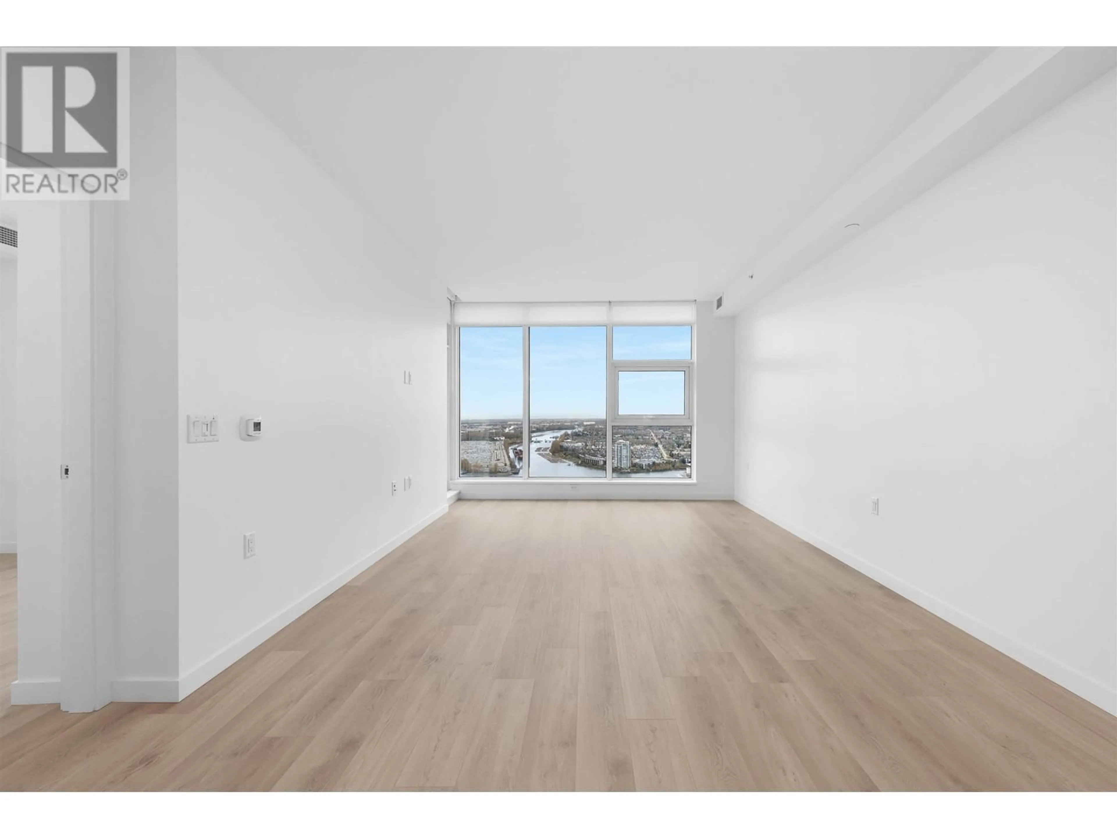 A pic of a room, wood floors for 4001 680 QUAYSIDE DRIVE, New Westminster British Columbia V3M0P2