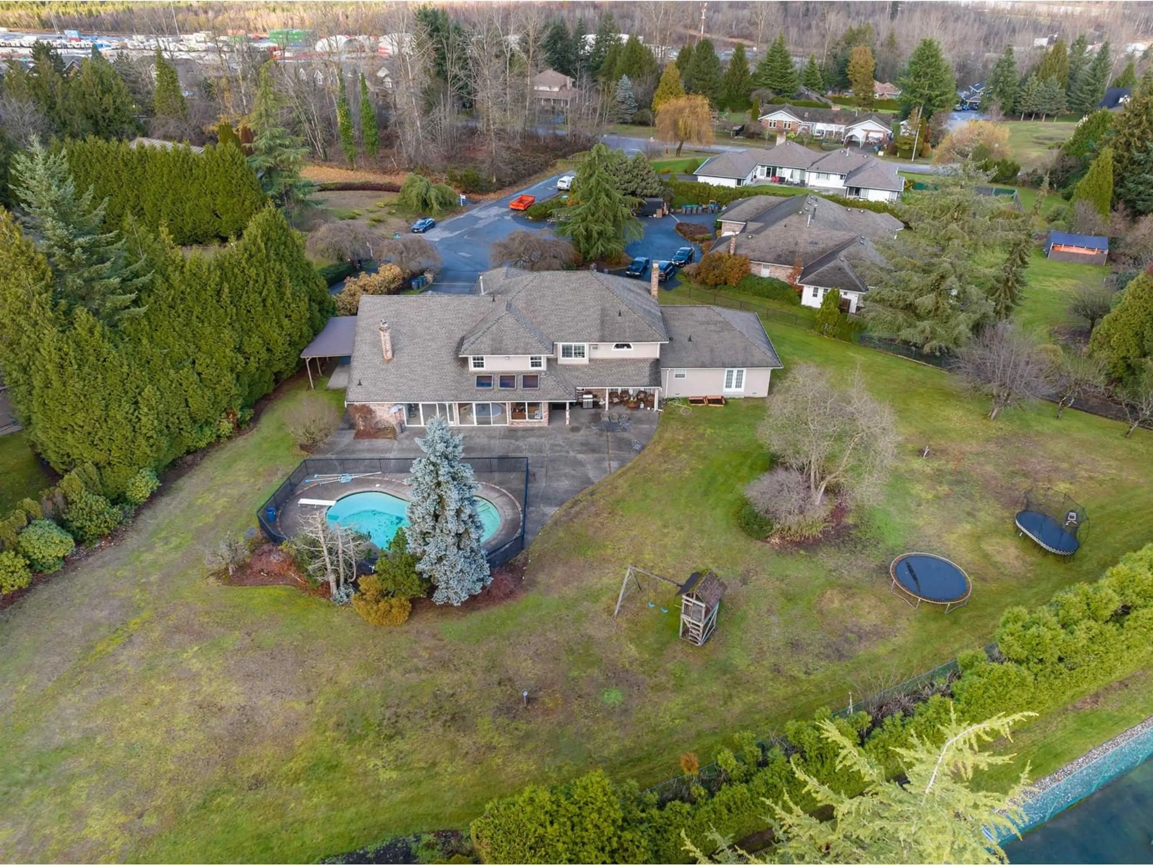 Frontside or backside of a home, the fenced backyard for 10156 174 STREET, Surrey British Columbia V4N4K3