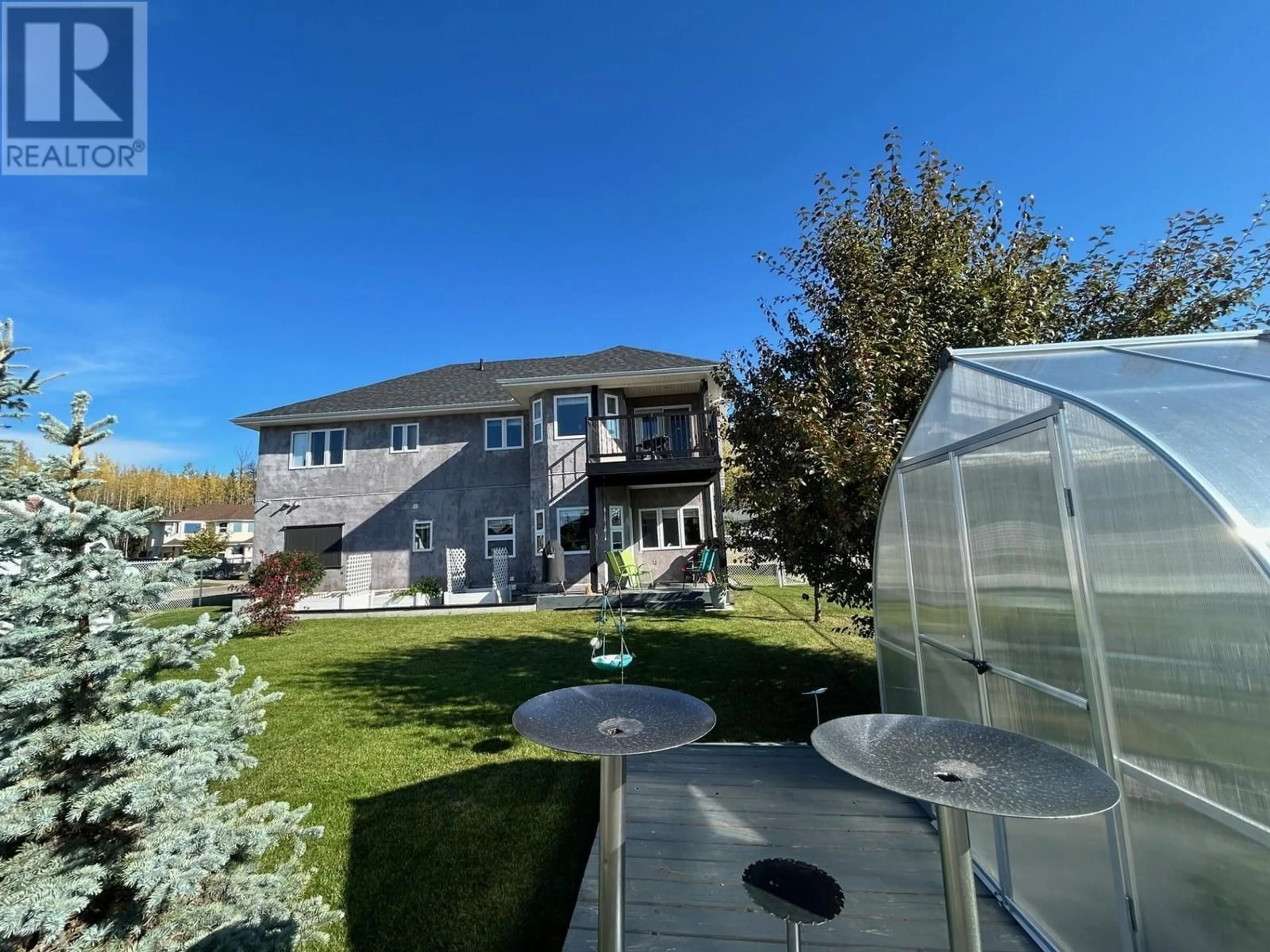 A pic from outside/outdoor area/front of a property/back of a property/a pic from drone, unknown for 5527 MINNAKER CRESCENT, Fort Nelson British Columbia V0C1R0