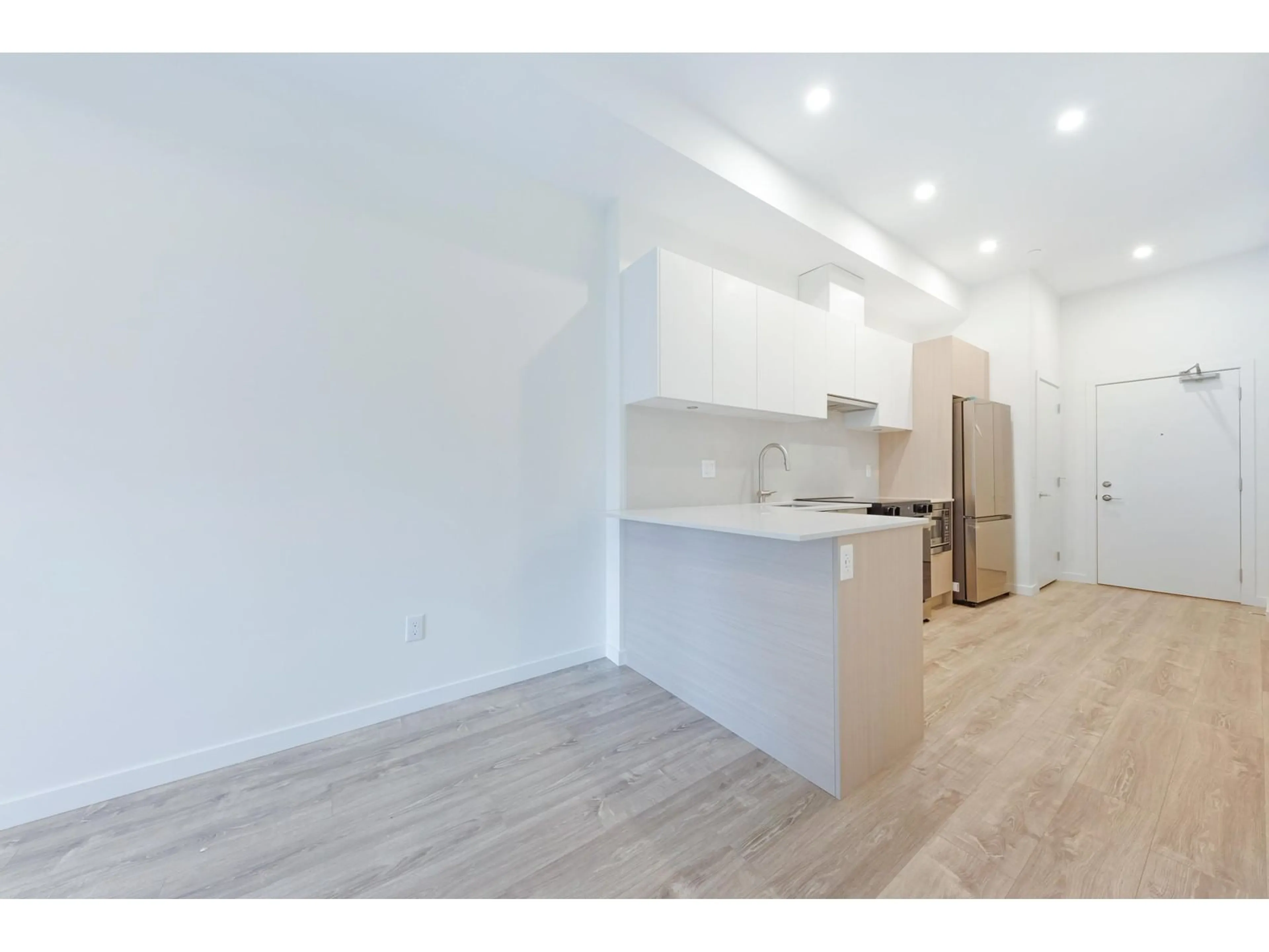 Open concept kitchen, wood/laminate floor for W108 - 10828 139A STREET, Surrey British Columbia V3R3E5