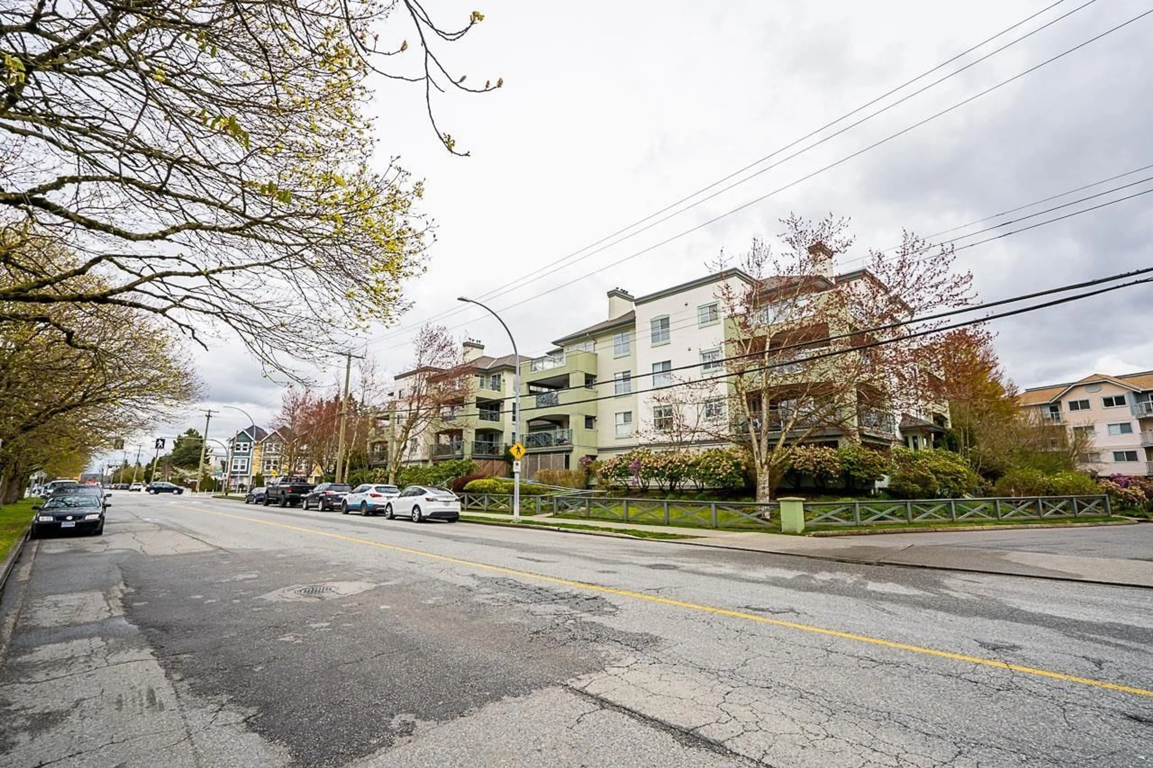 A pic from exterior of the house or condo, the street view for 407 20110 MICHAUD CRESCENT, Langley British Columbia V3A4B1