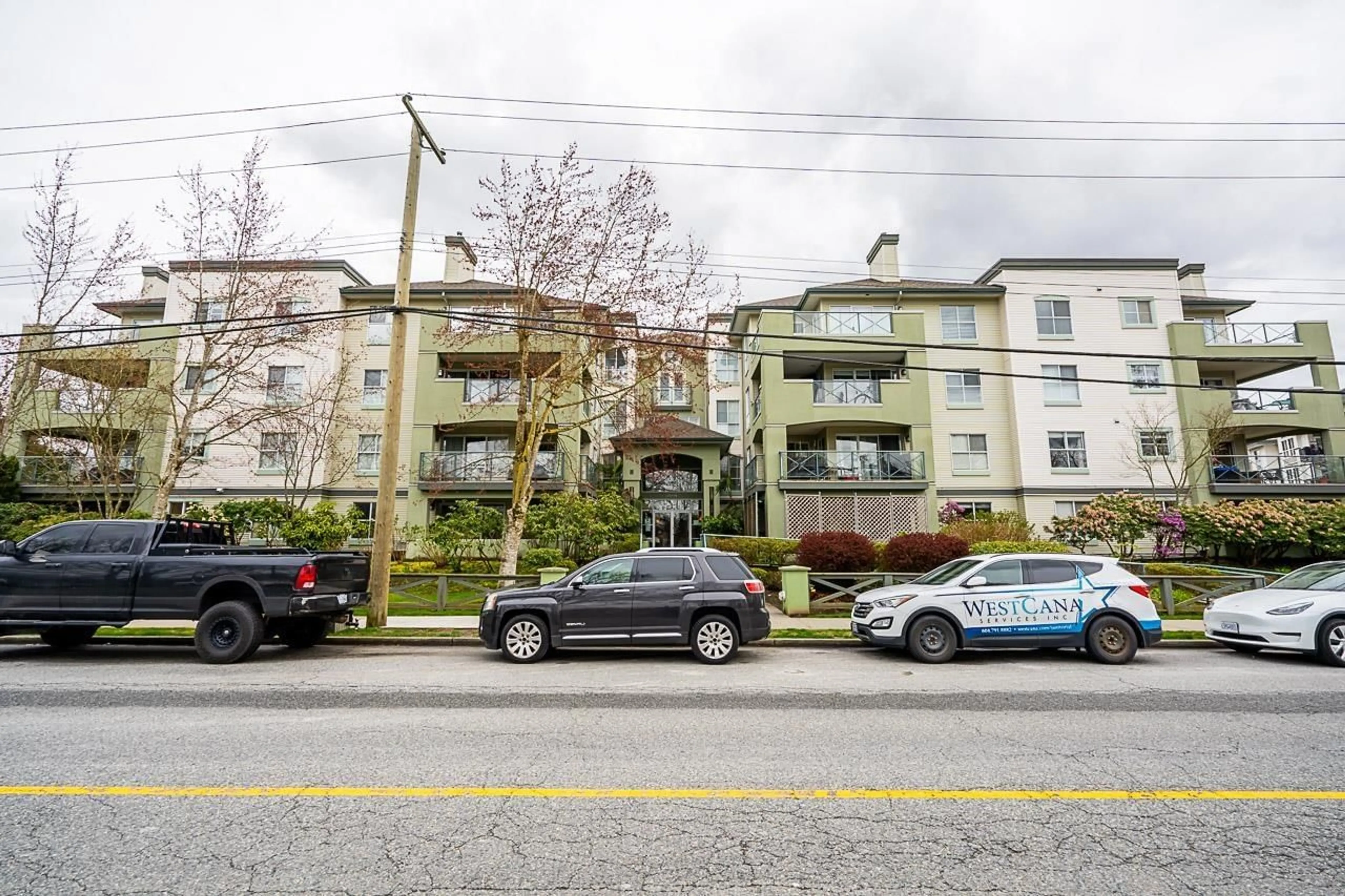 A pic from exterior of the house or condo, the street view for 407 20110 MICHAUD CRESCENT, Langley British Columbia V3A4B1