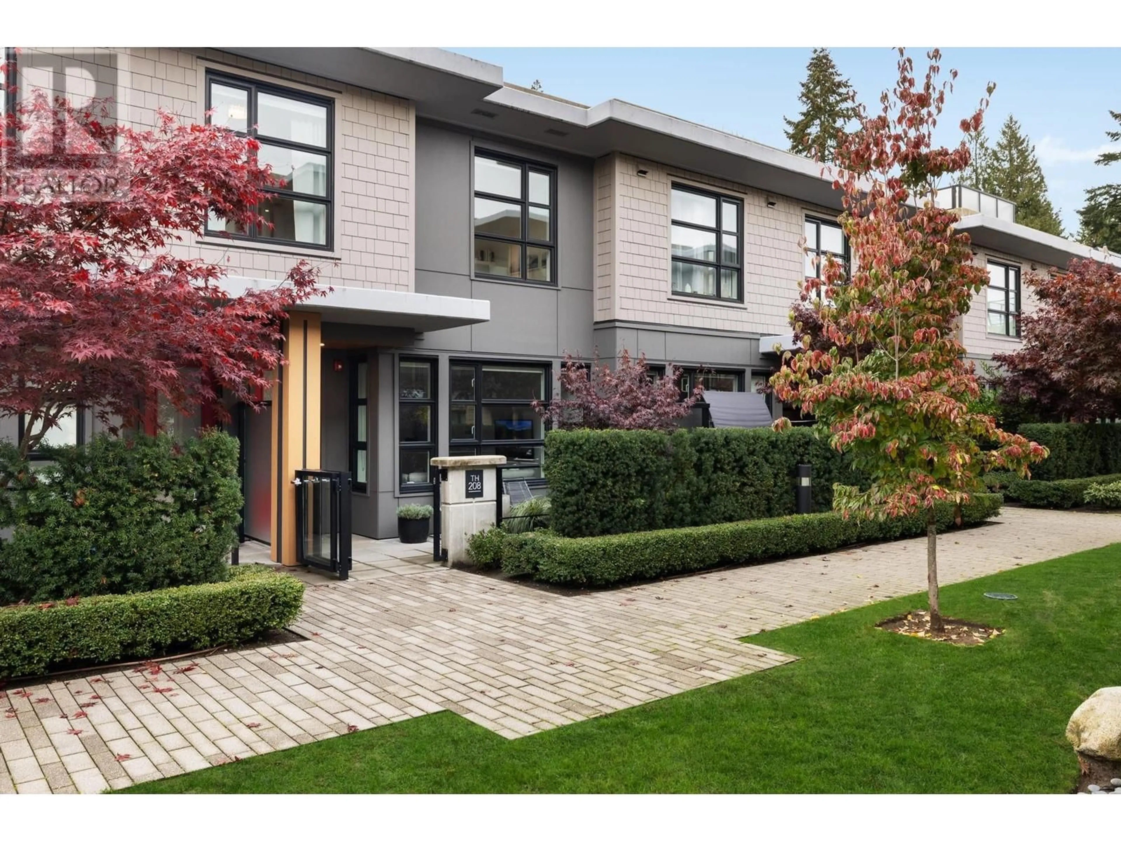 Home with brick exterior material for 208 1055 RIDGEWOOD DRIVE, North Vancouver British Columbia V7R0A6