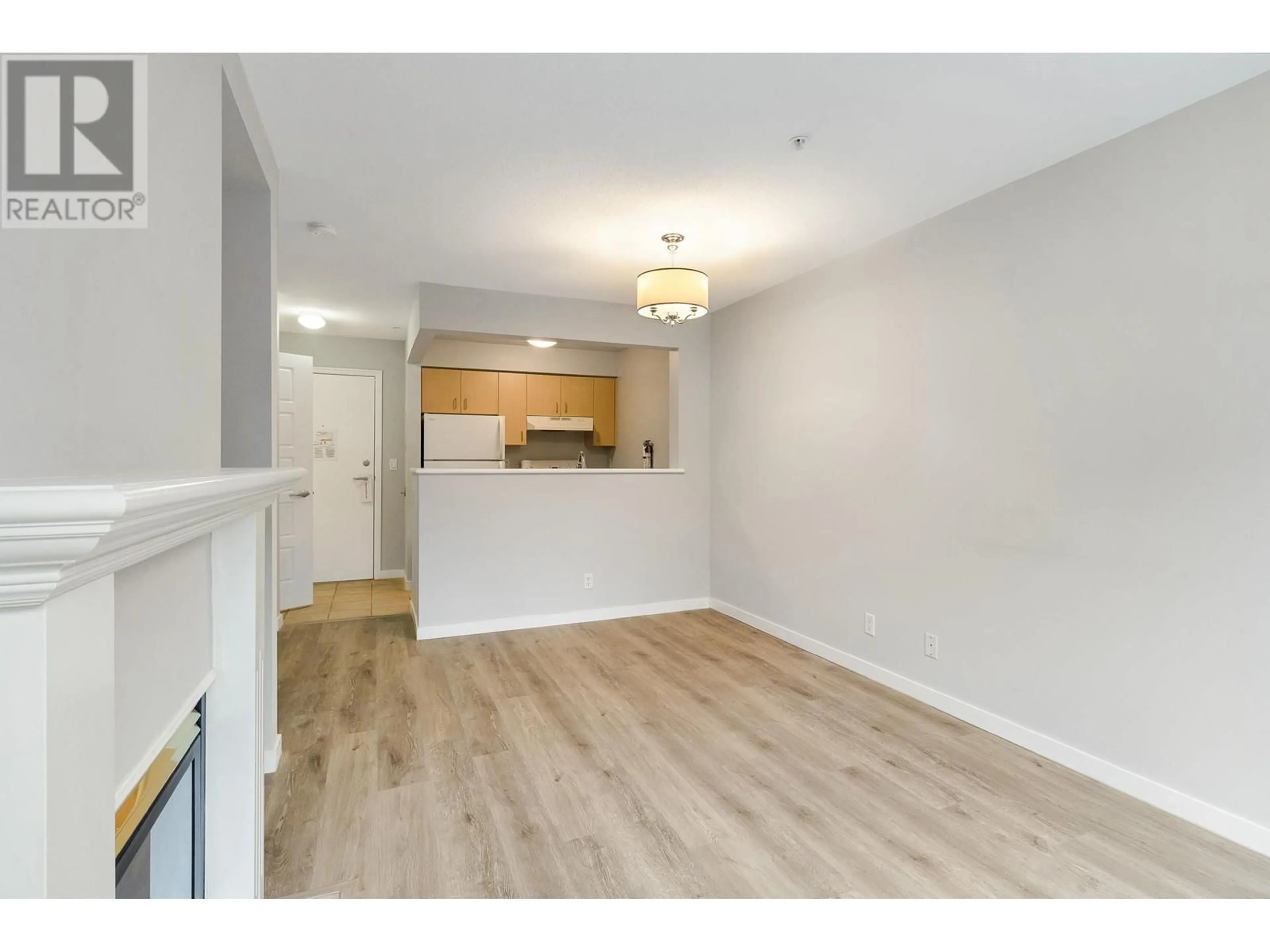 A pic of a room, wood floors for 202 2266 ATKINS AVENUE, Port Coquitlam British Columbia V3C6N5