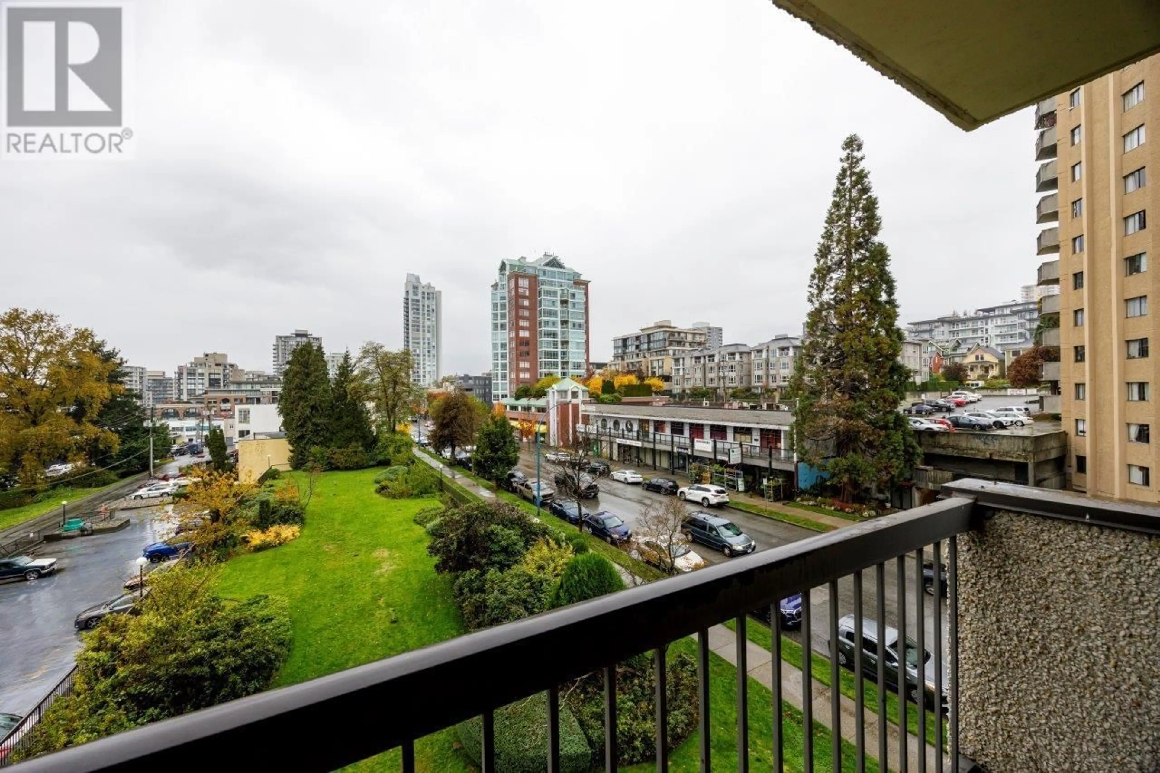 Balcony in the apartment, the view of city buildings for 403 145 ST. GEORGES AVENUE, North Vancouver British Columbia V7L3G8