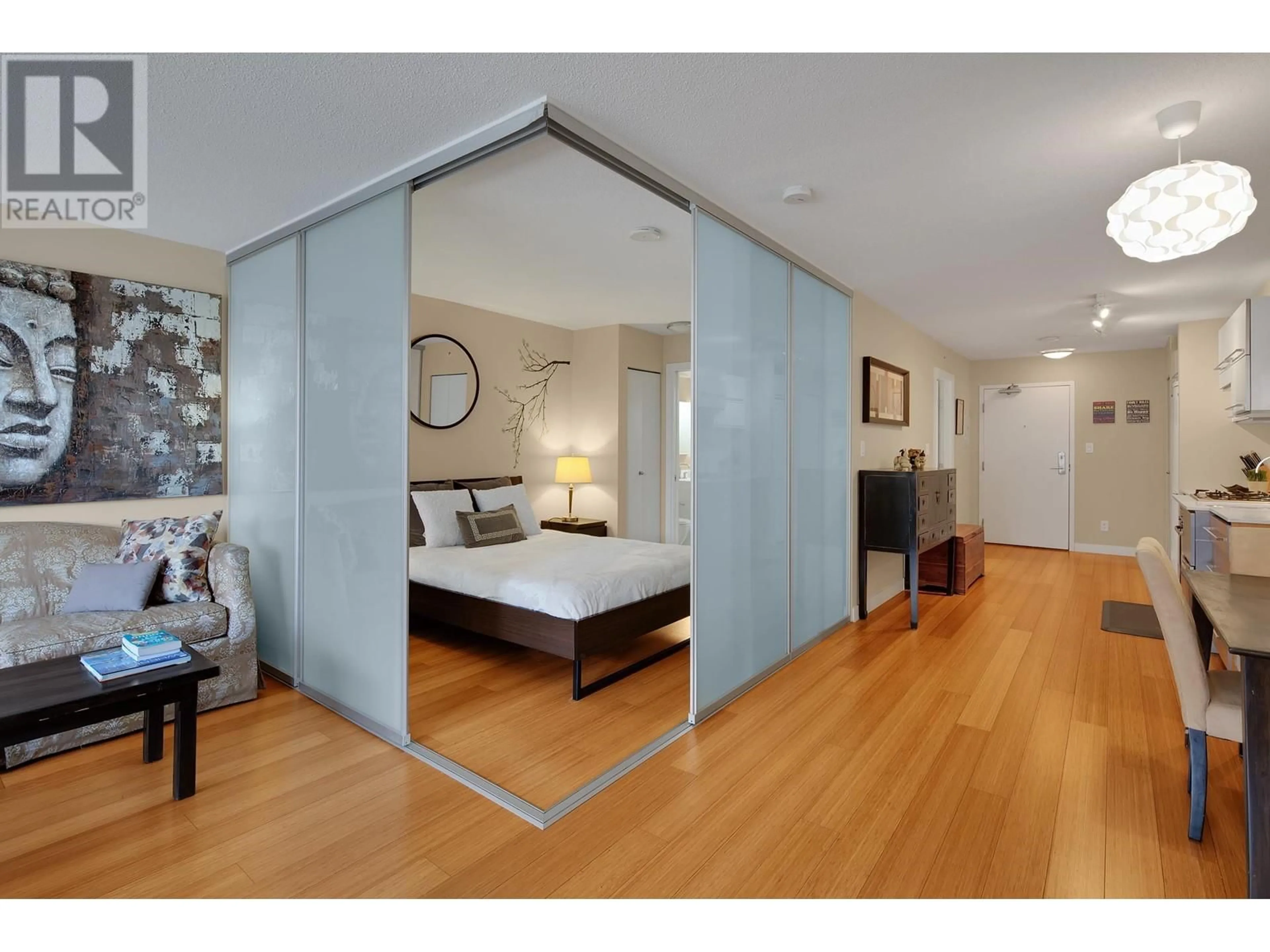 Indoor entryway, wood floors for 203 718 MAIN STREET, Vancouver British Columbia V6A0B1