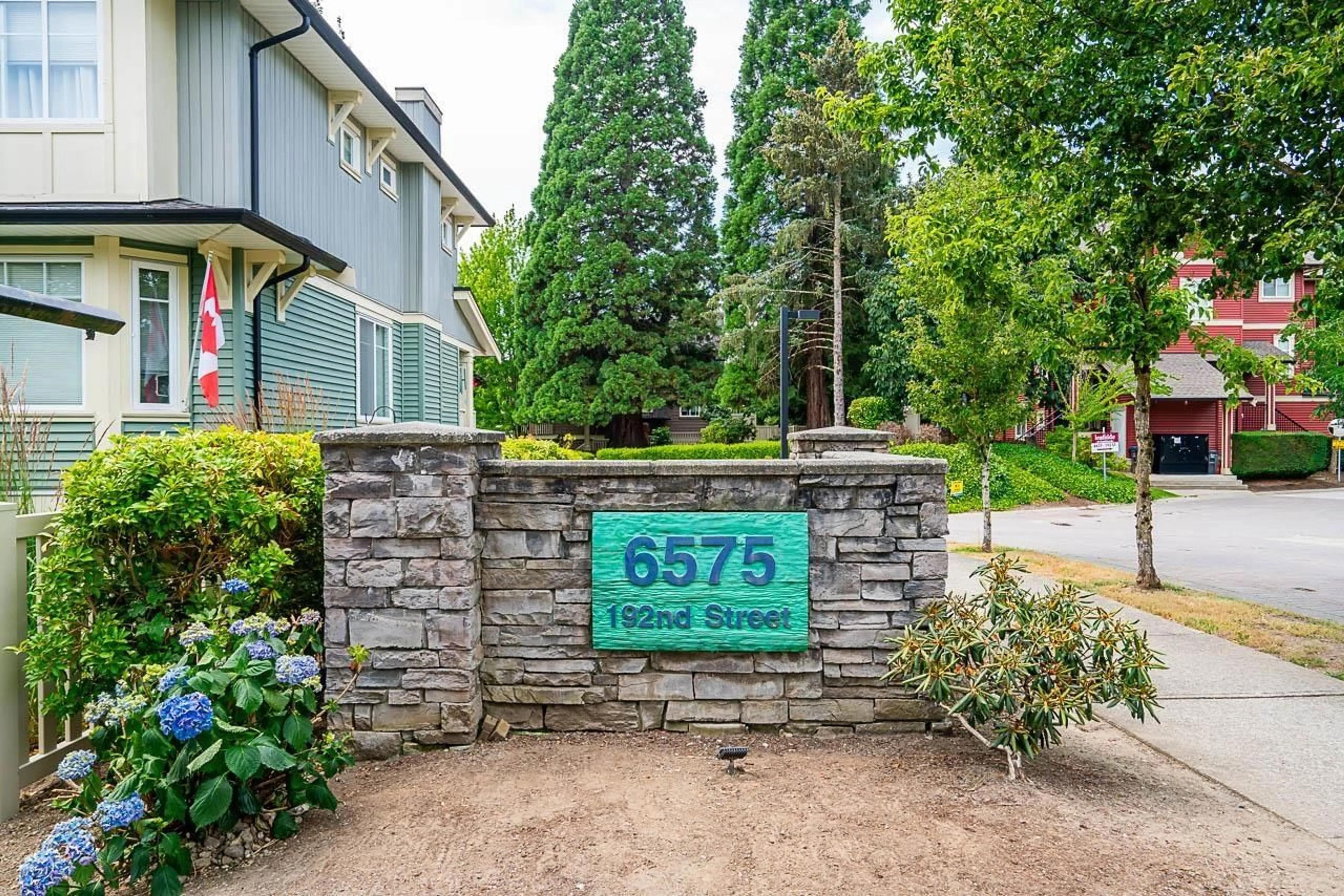 A pic from exterior of the house or condo, the street view for 12 6575 192 STREET, Surrey British Columbia V4N5T8