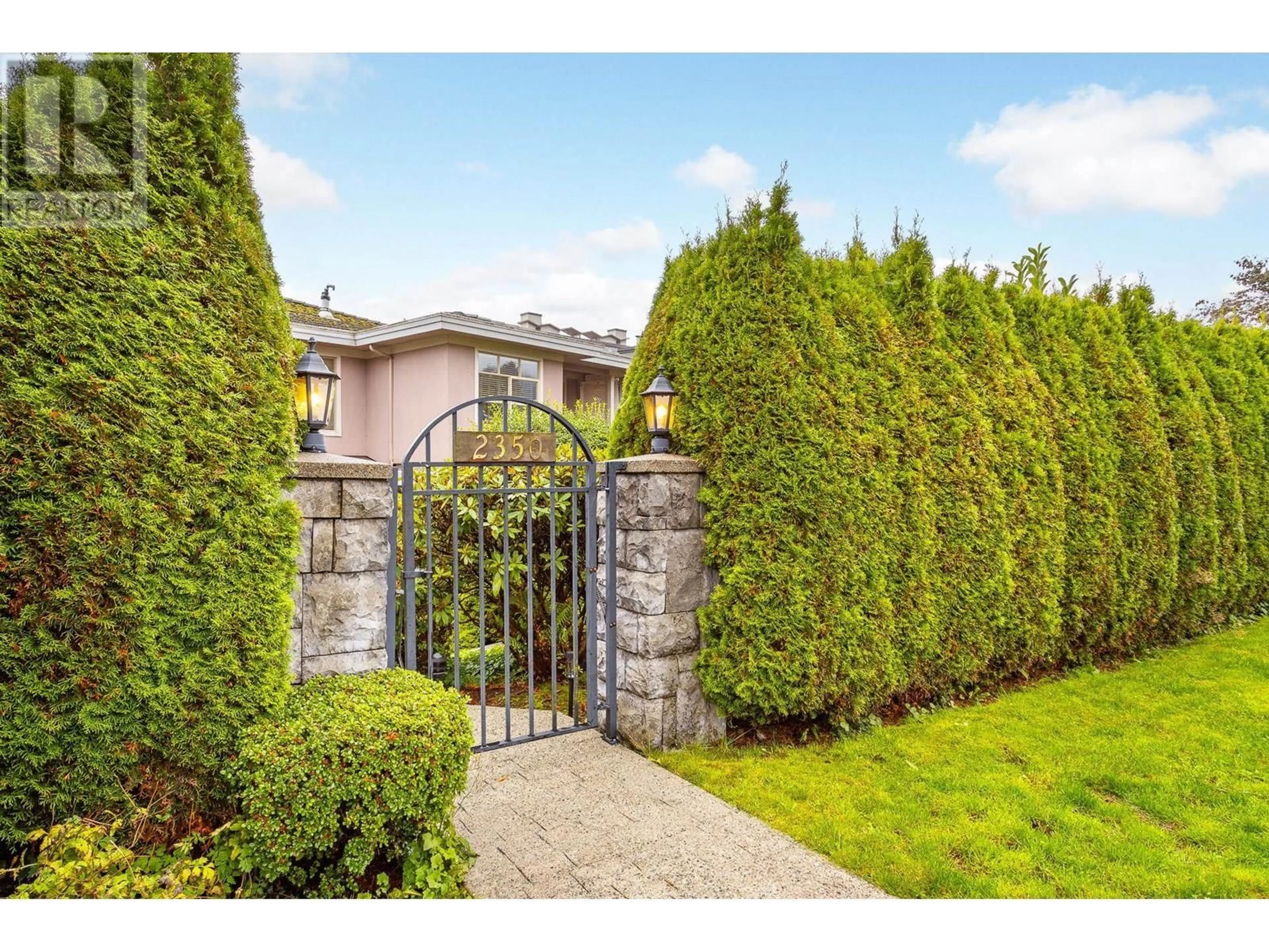 Frontside or backside of a home, the fenced backyard for 2350 MARINE DRIVE, West Vancouver British Columbia V7V1K8