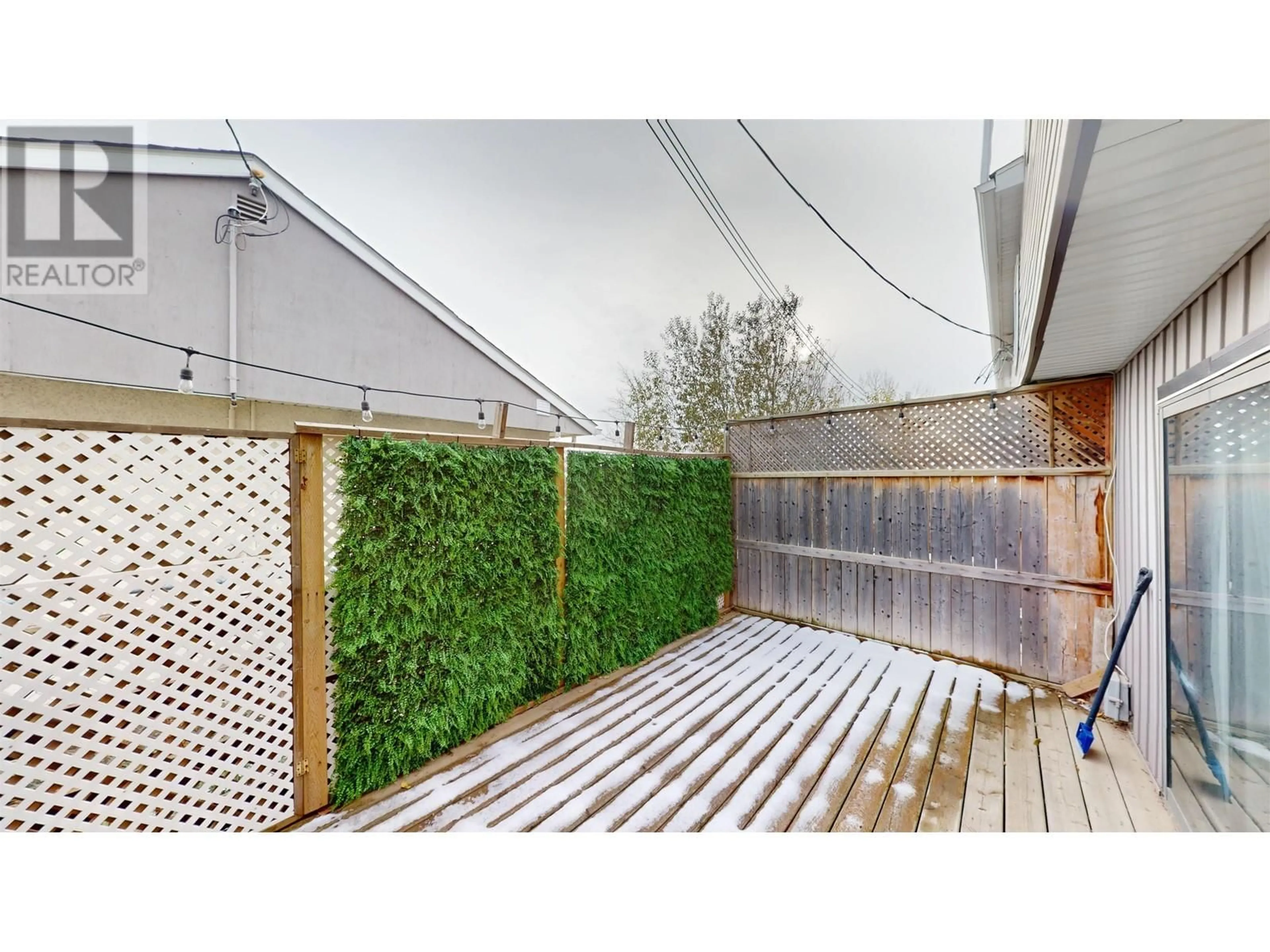 Patio, the fenced backyard for 9827 97 STREET, Fort St. John British Columbia V1J3S4