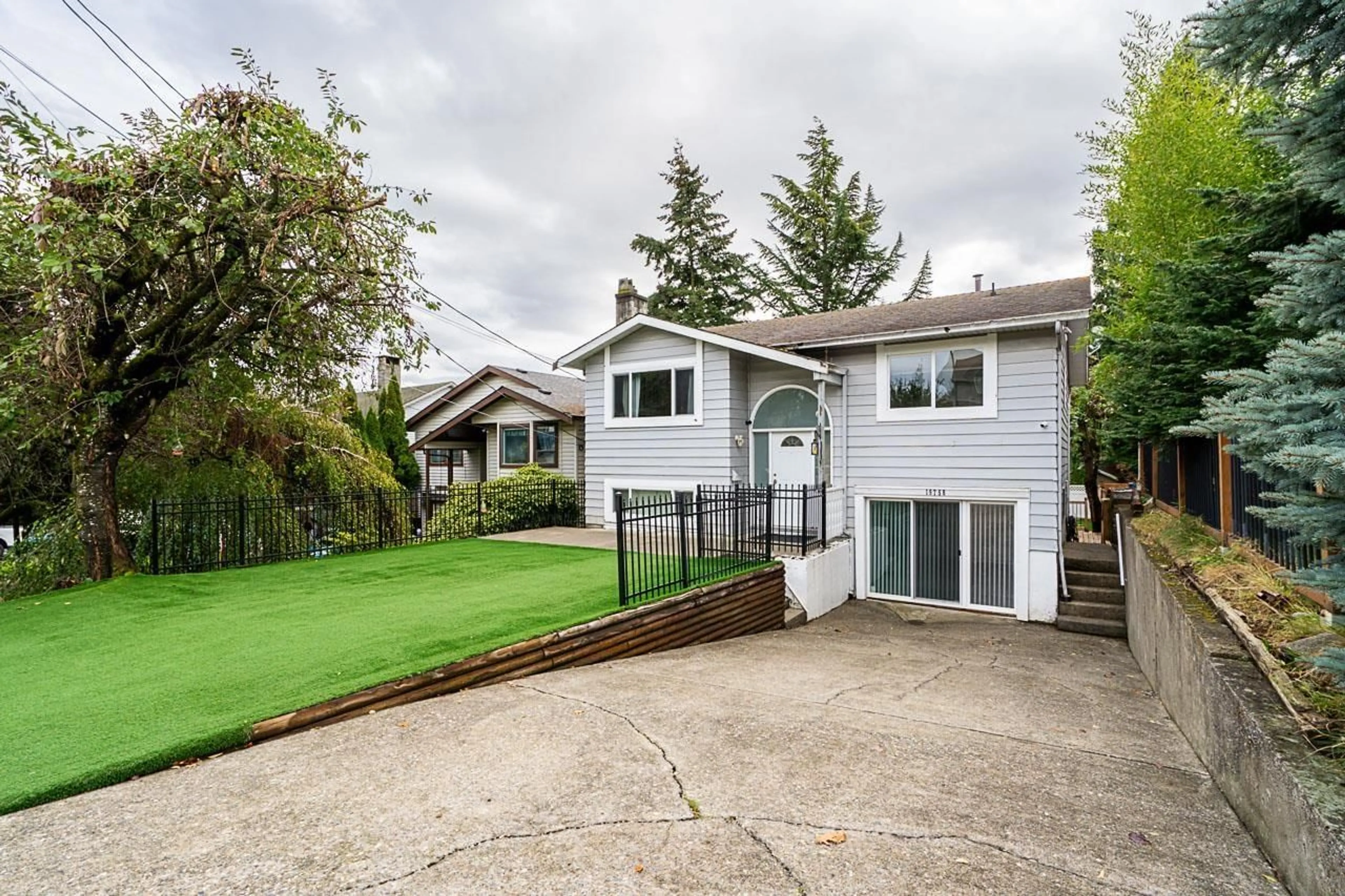 Frontside or backside of a home, the fenced backyard for 19758 68 AVENUE, Langley British Columbia V2Y1H6