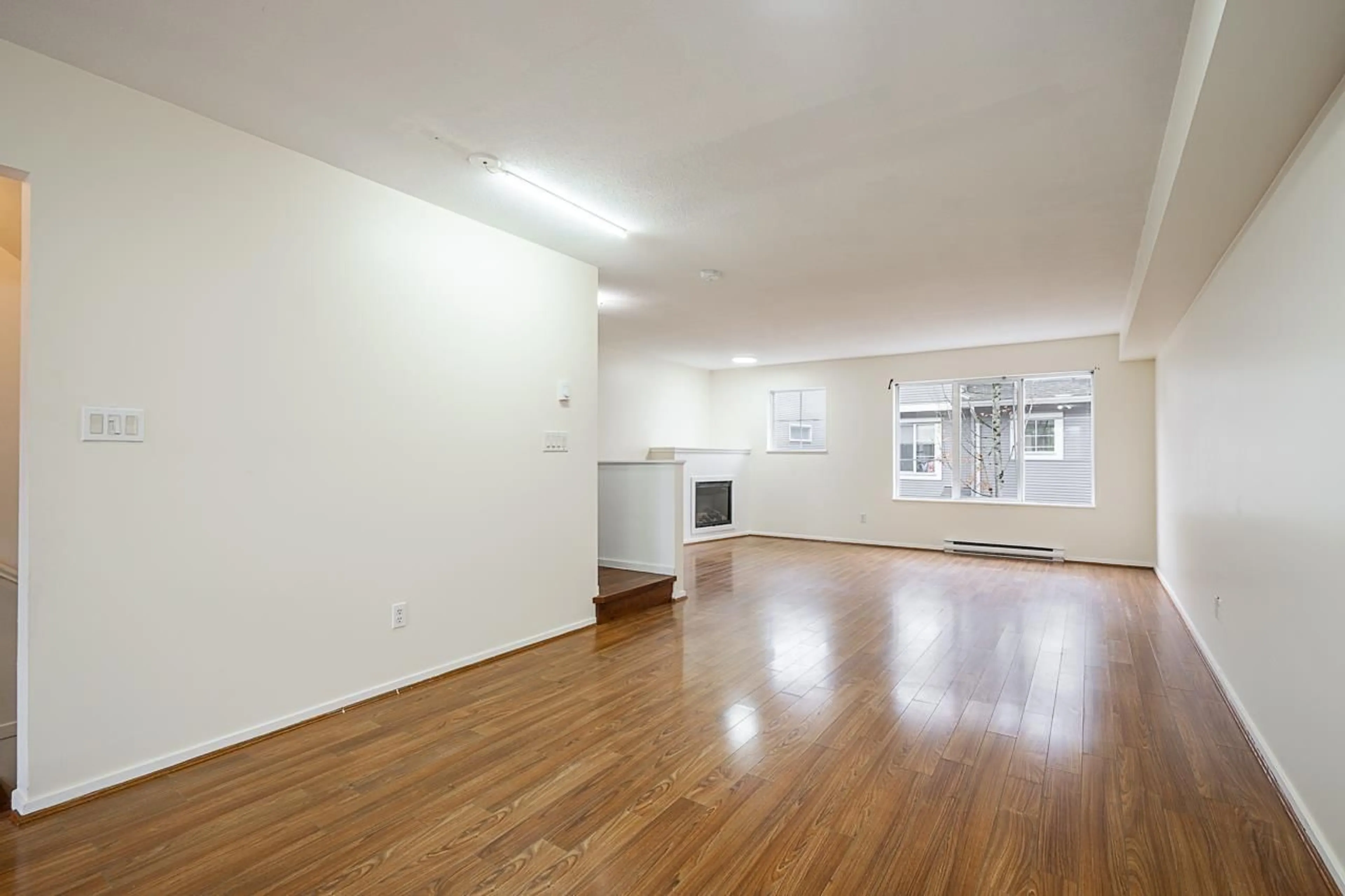 A pic of a room, wood floors for 53 15155 62A AVENUE, Surrey British Columbia V3S8A6