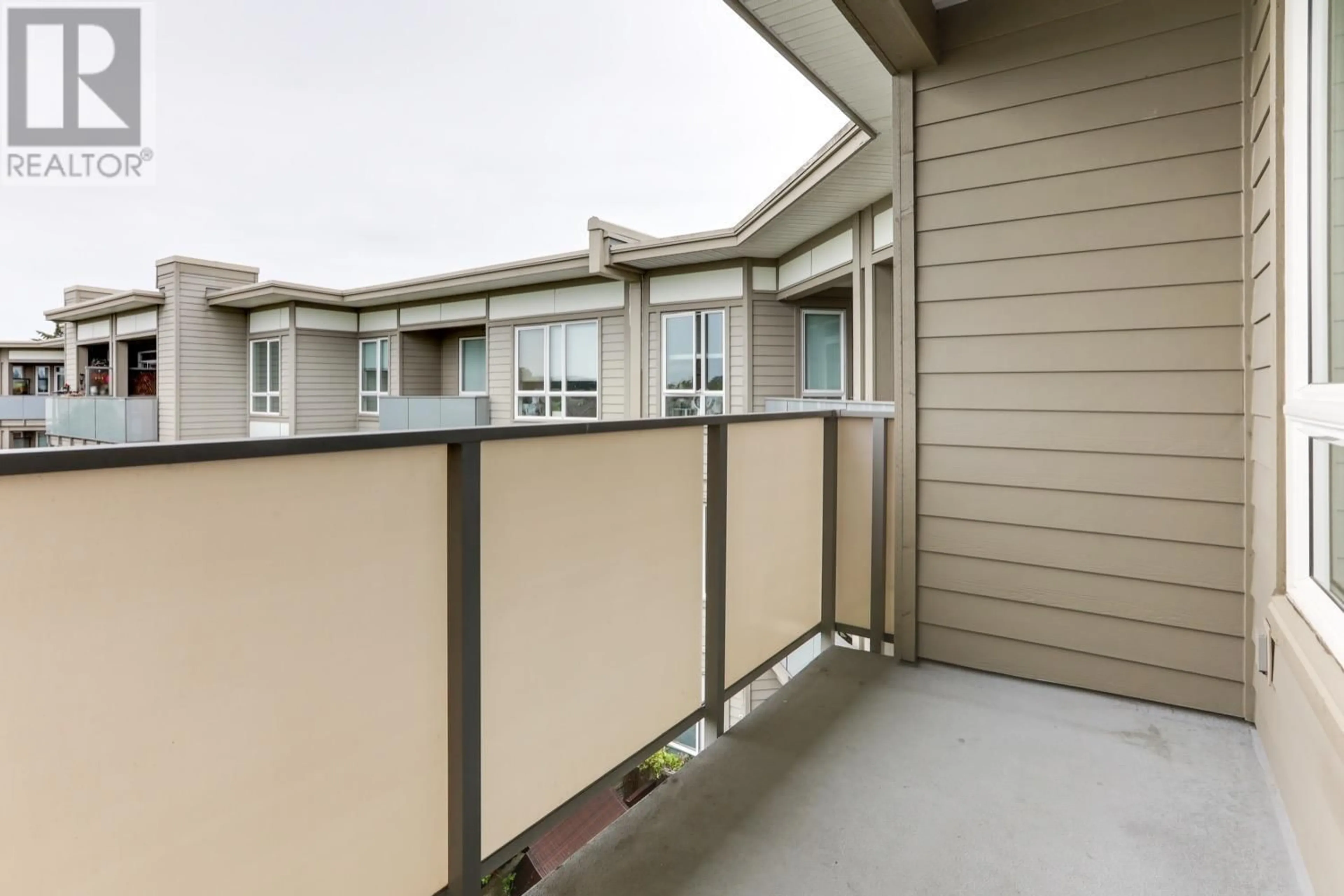 Balcony in the apartment, the fenced backyard for 416 10880 NO. 5 ROAD, Richmond British Columbia V6W0B3