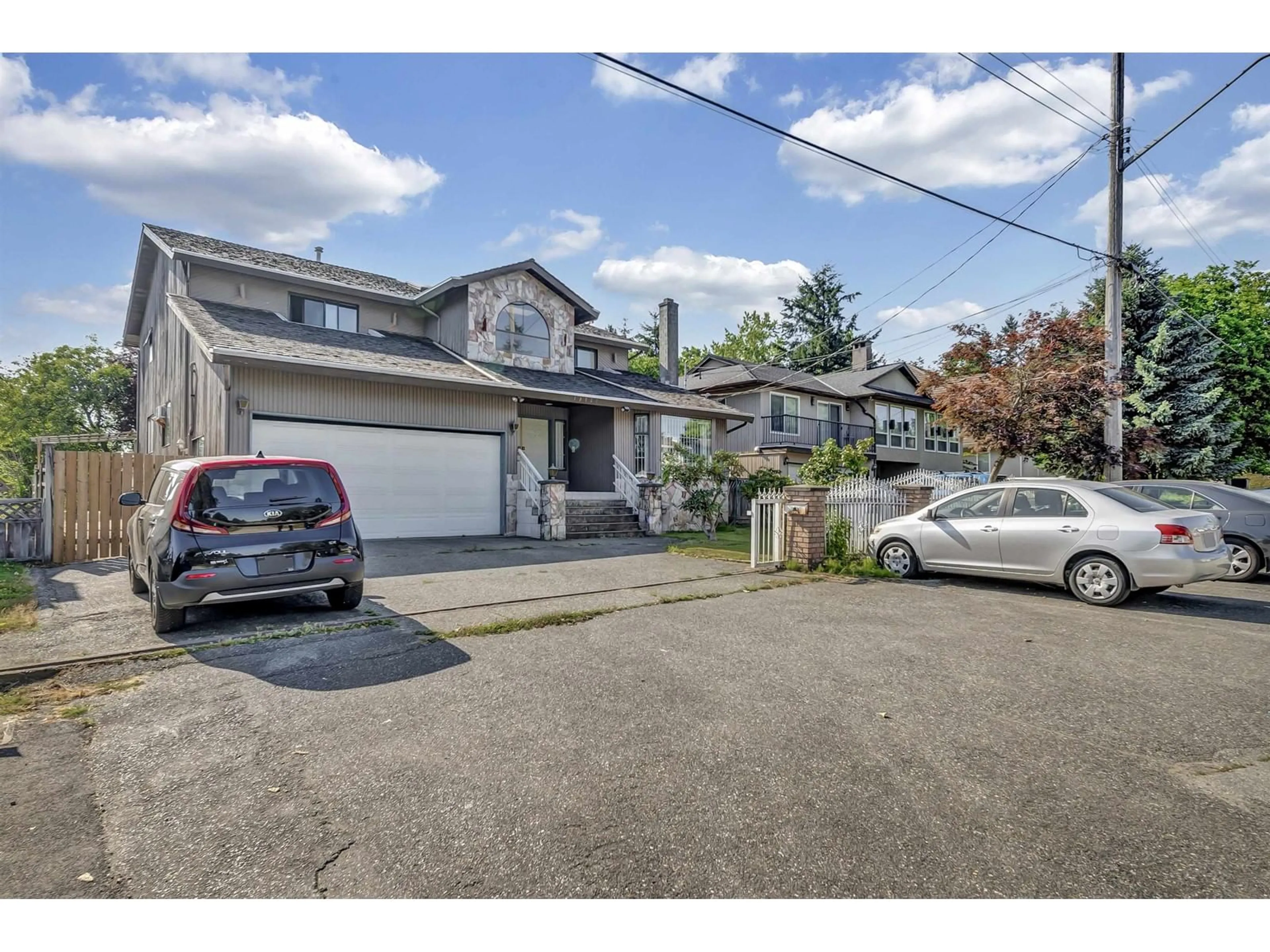 A pic from outside/outdoor area/front of a property/back of a property/a pic from drone, street for 10627 138A, Surrey British Columbia V3T4L2