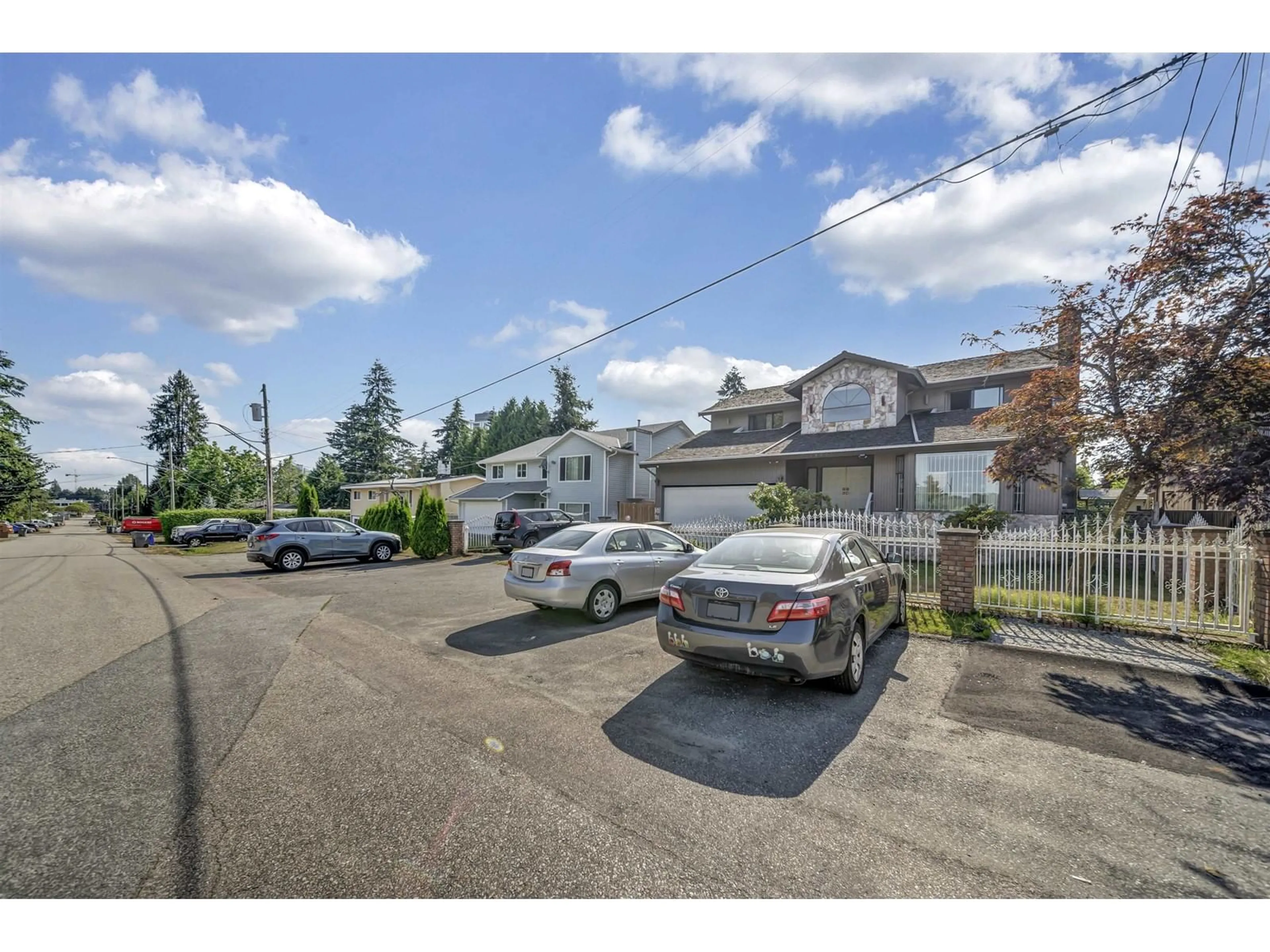 A pic from outside/outdoor area/front of a property/back of a property/a pic from drone, street for 10627 138A, Surrey British Columbia V3T4L2