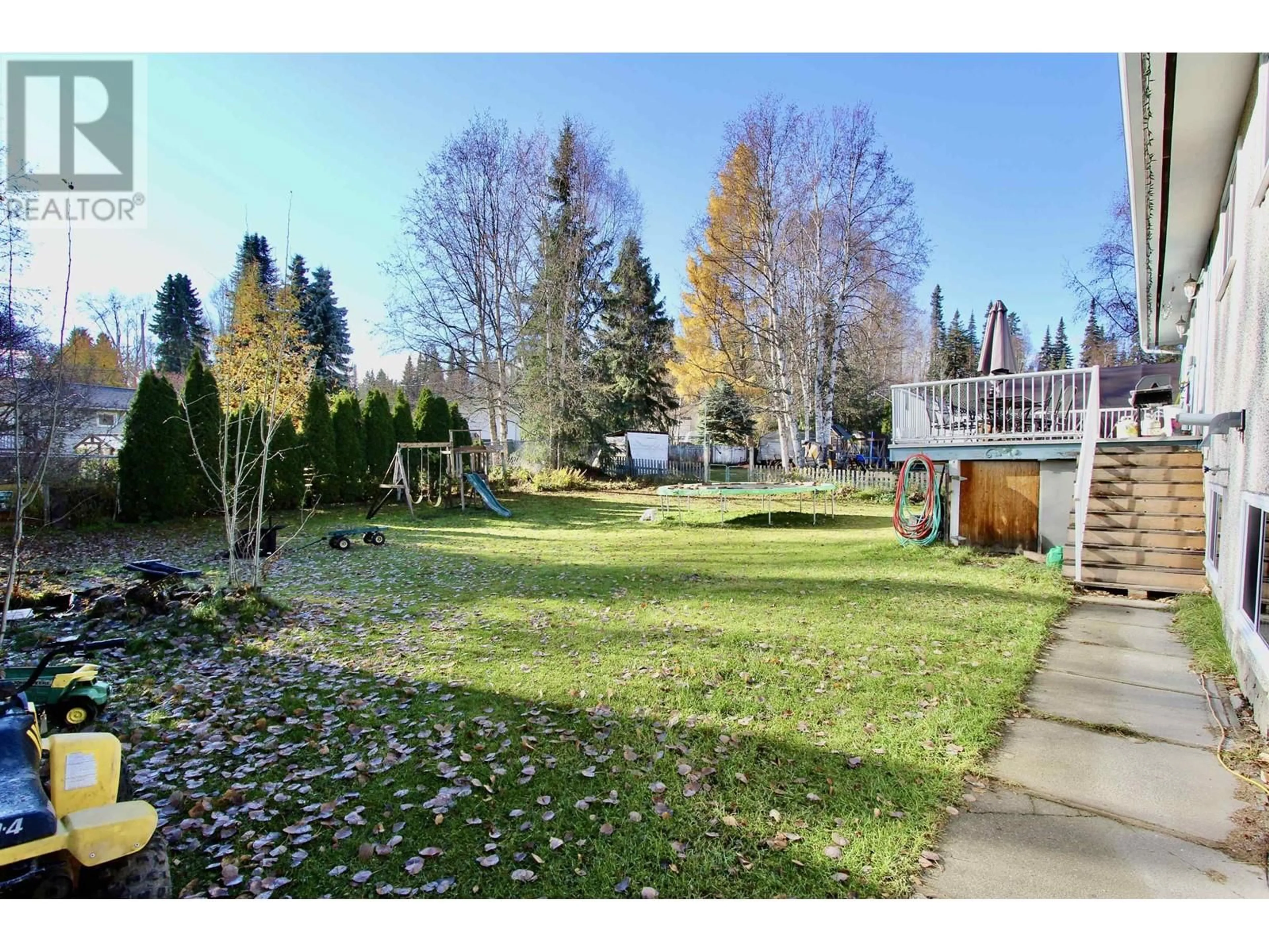 A pic from exterior of the house or condo, the fenced backyard for 4717 HEATHER ROAD, Prince George British Columbia V2K2J3