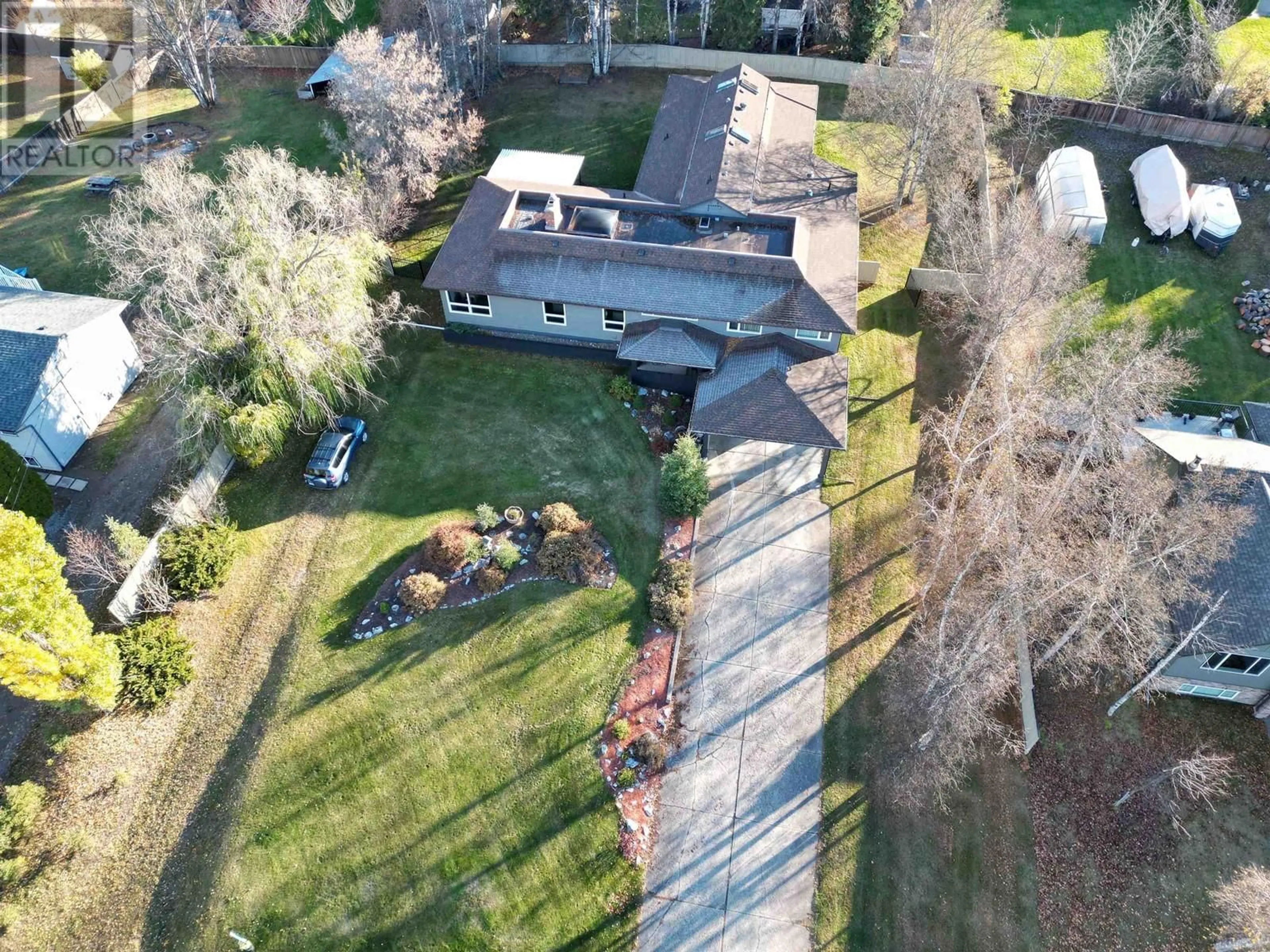 Frontside or backside of a home, the fenced backyard for 2855 PARENT ROAD, Prince George British Columbia V2N5G2