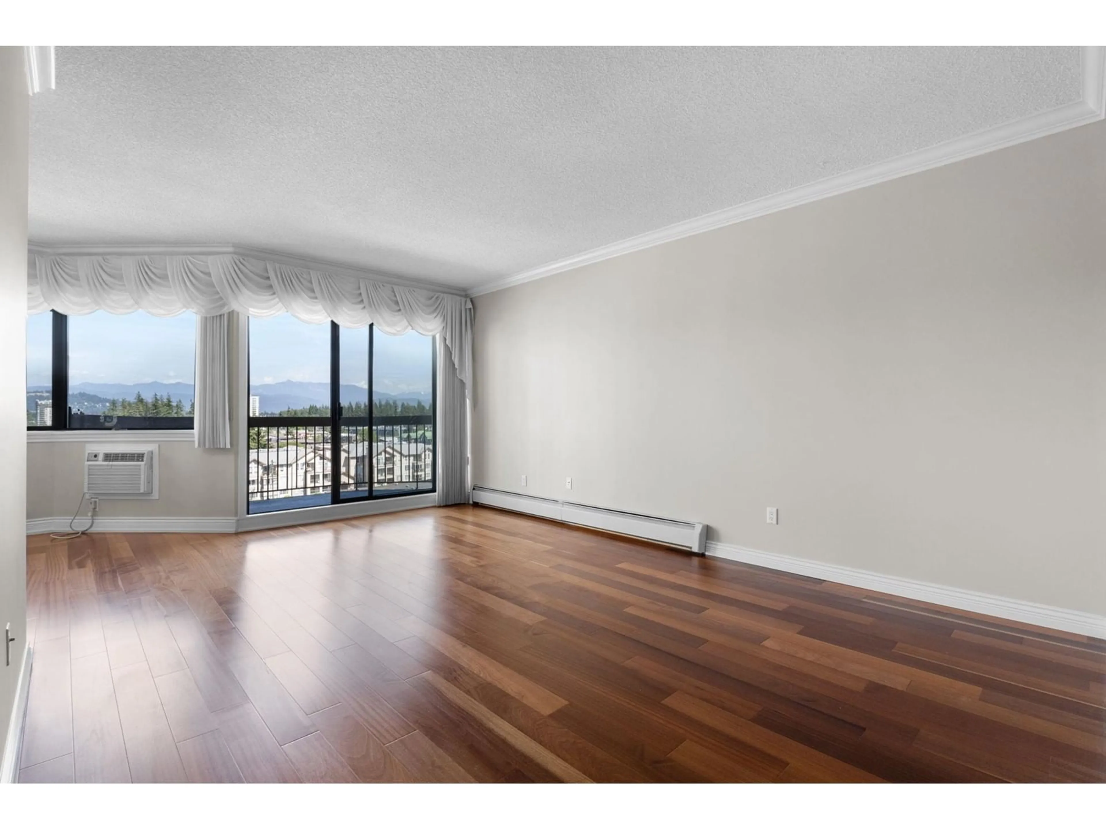 A pic of a room, wood floors for 919 31955 OLD YALE ROAD, Abbotsford British Columbia V2T4N1