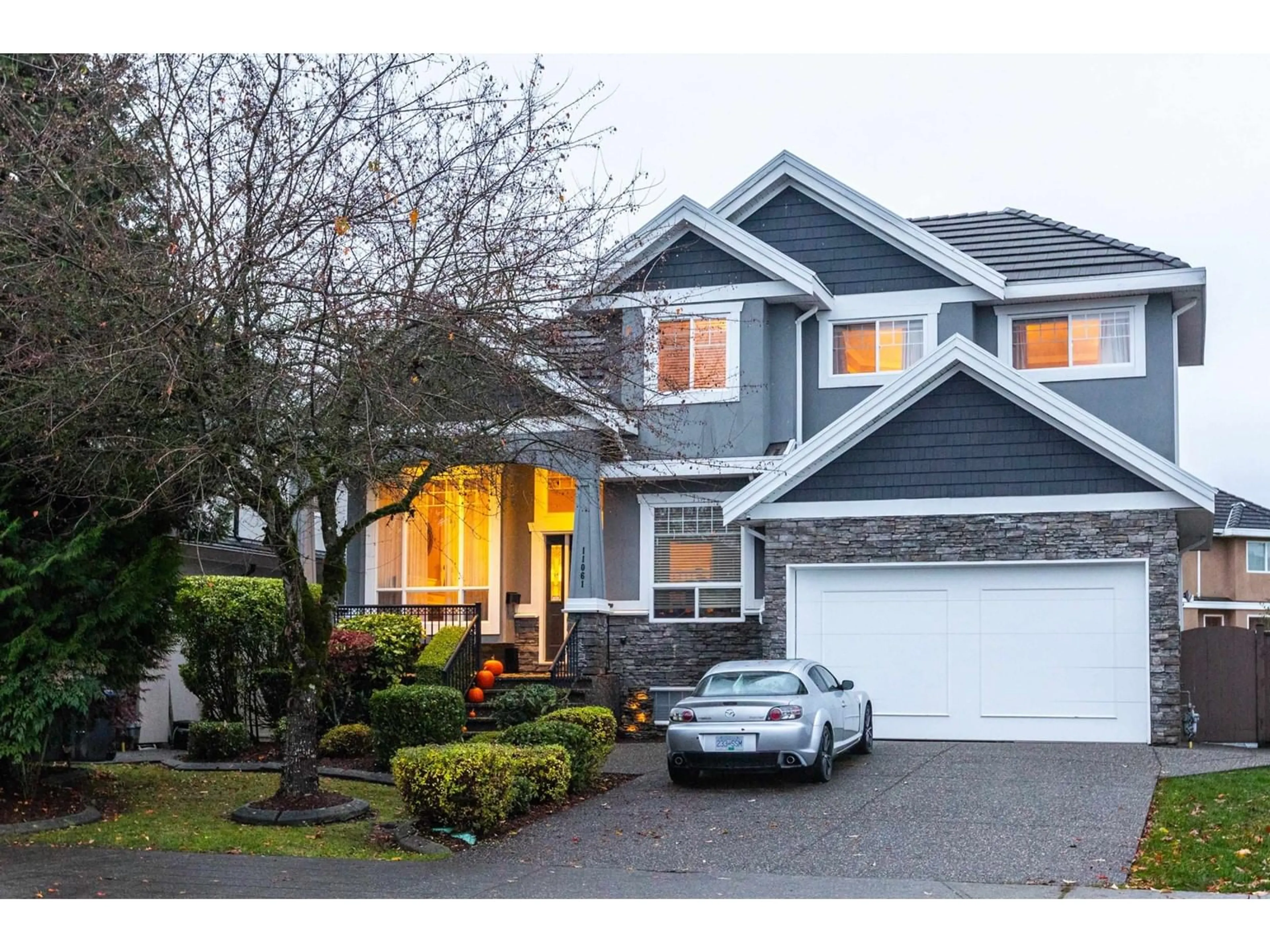 Frontside or backside of a home, the street view for 11061 160 STREET, Surrey British Columbia V4N1J2