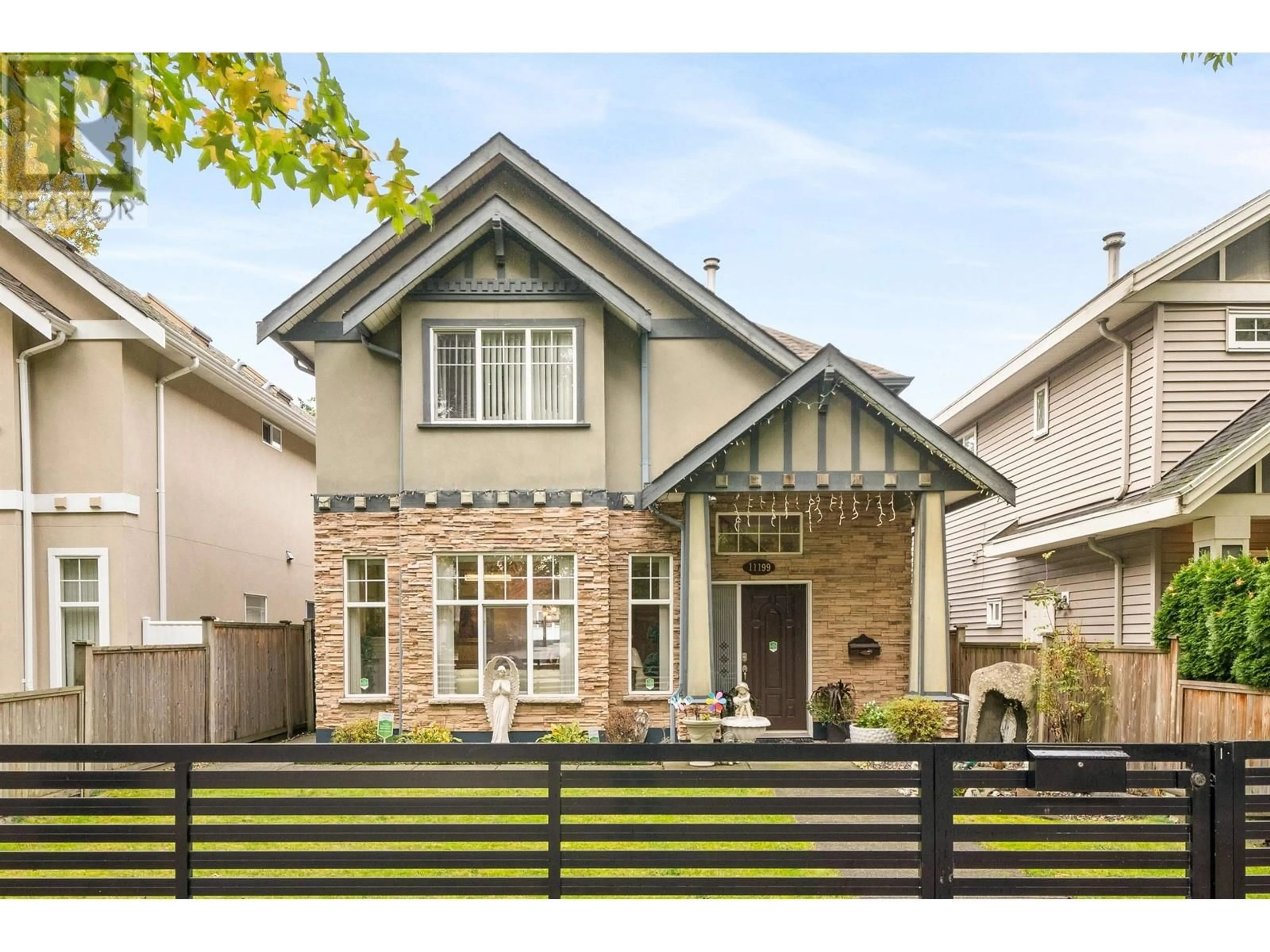 Home with brick exterior material for 11199 WILLIAMS ROAD, Richmond British Columbia V7A1J2