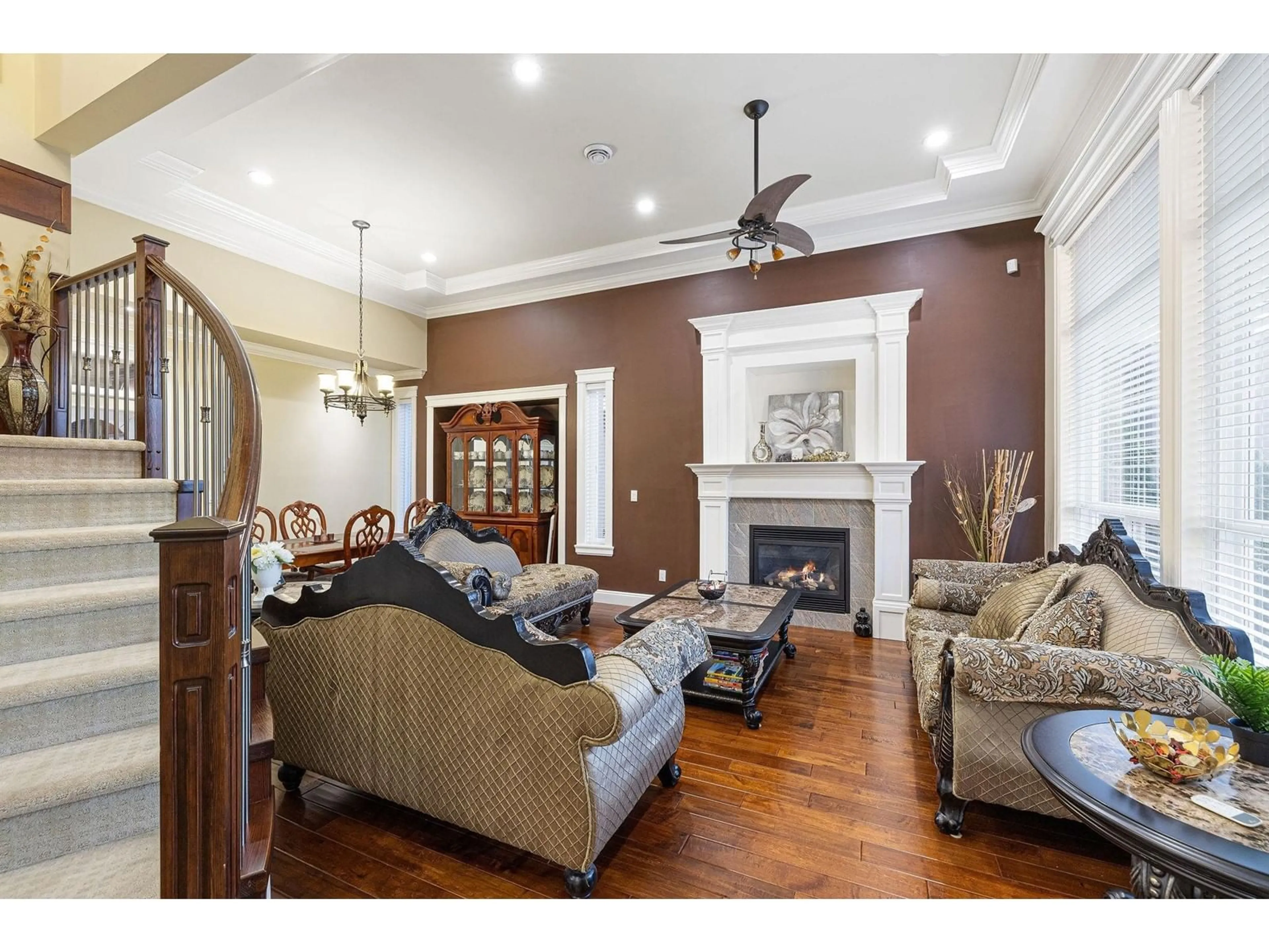 Living room with furniture, wood/laminate floor for 15670 107 AVENUE, Surrey British Columbia V4N3H8