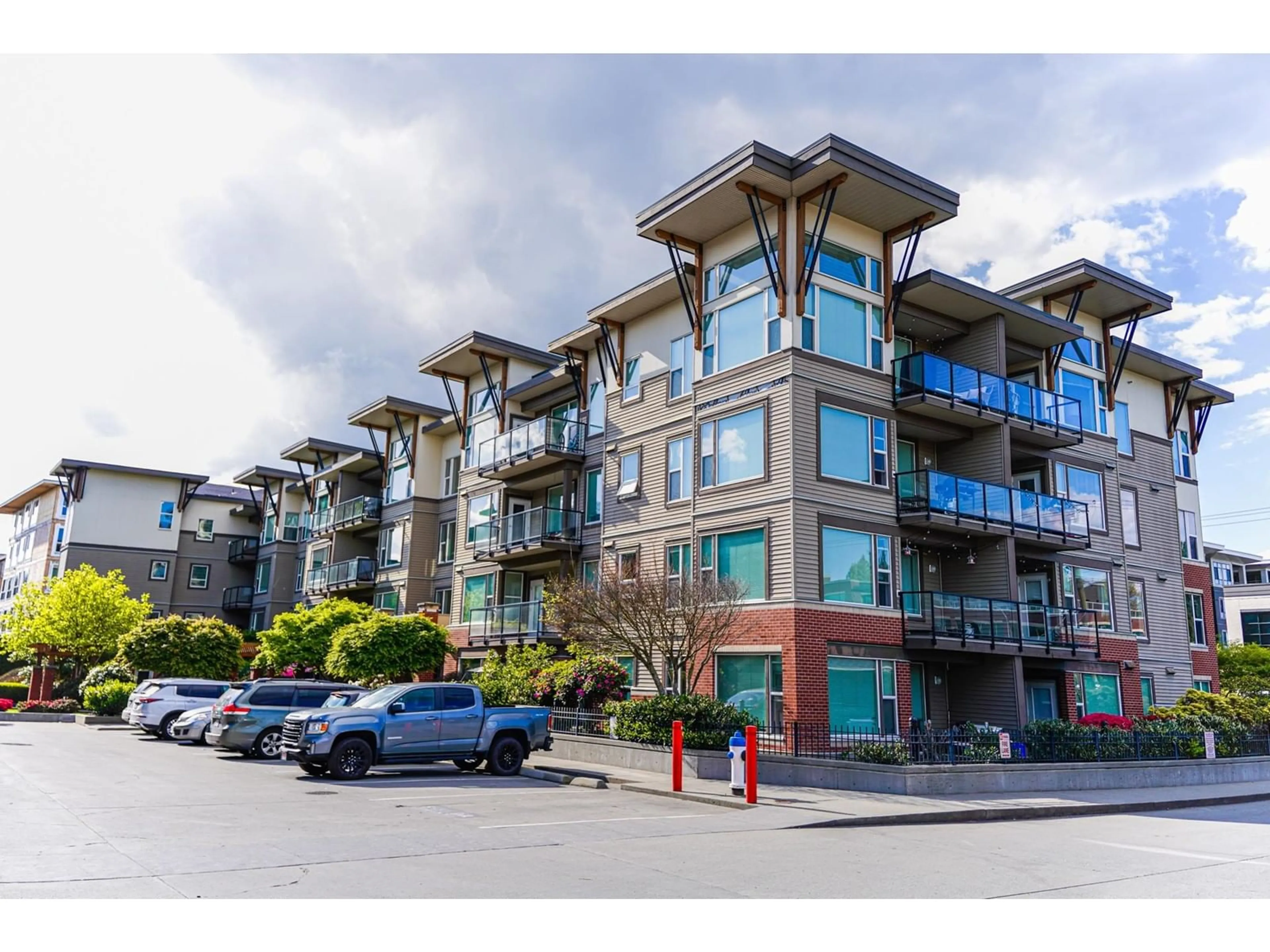 A pic from exterior of the house or condo, the street view for 310 33538 MARSHALL ROAD, Abbotsford British Columbia V2S0C7