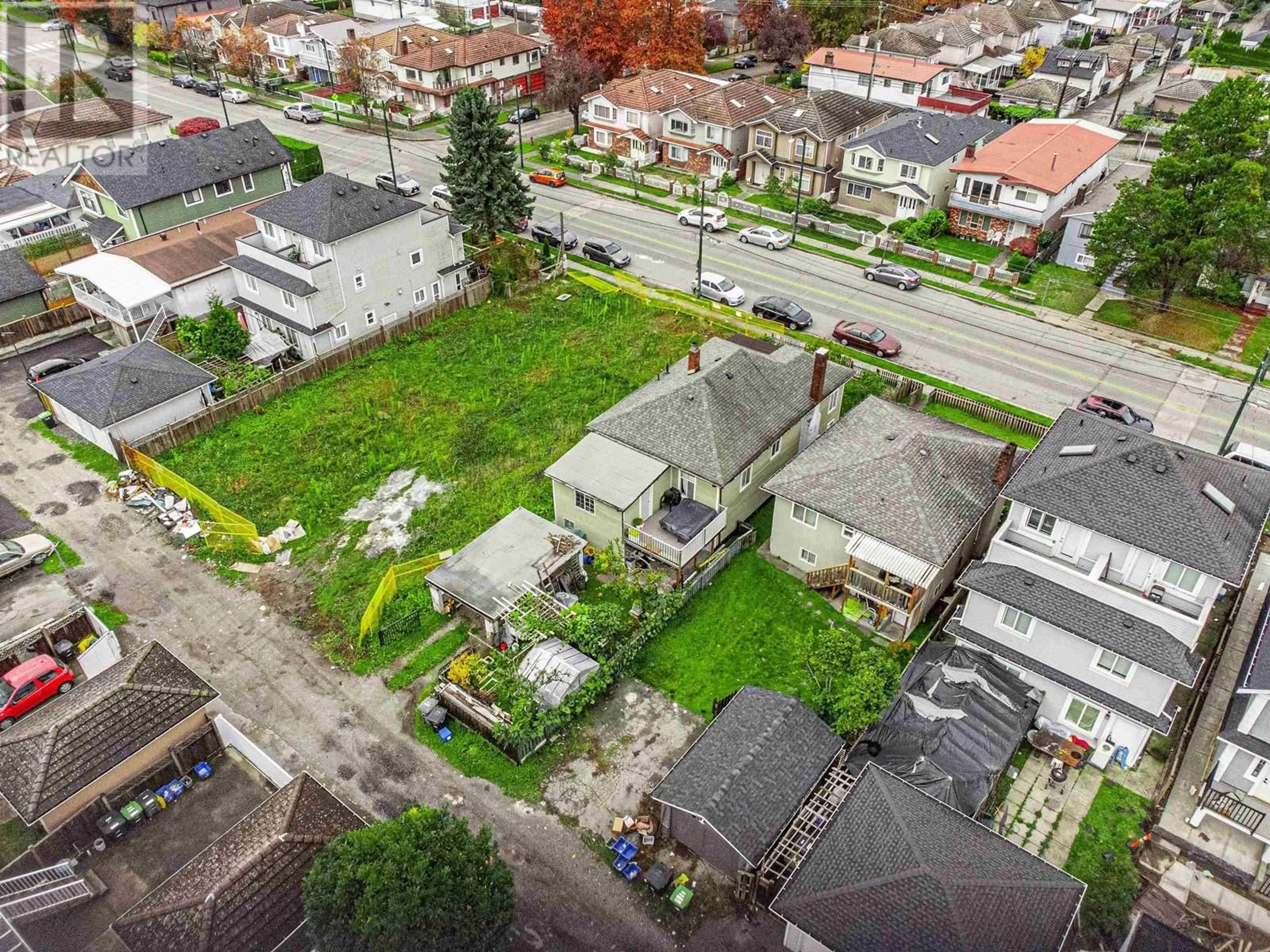 A pic from outside/outdoor area/front of a property/back of a property/a pic from drone, street for 4836 EARLES STREET, Vancouver British Columbia V5R3R5