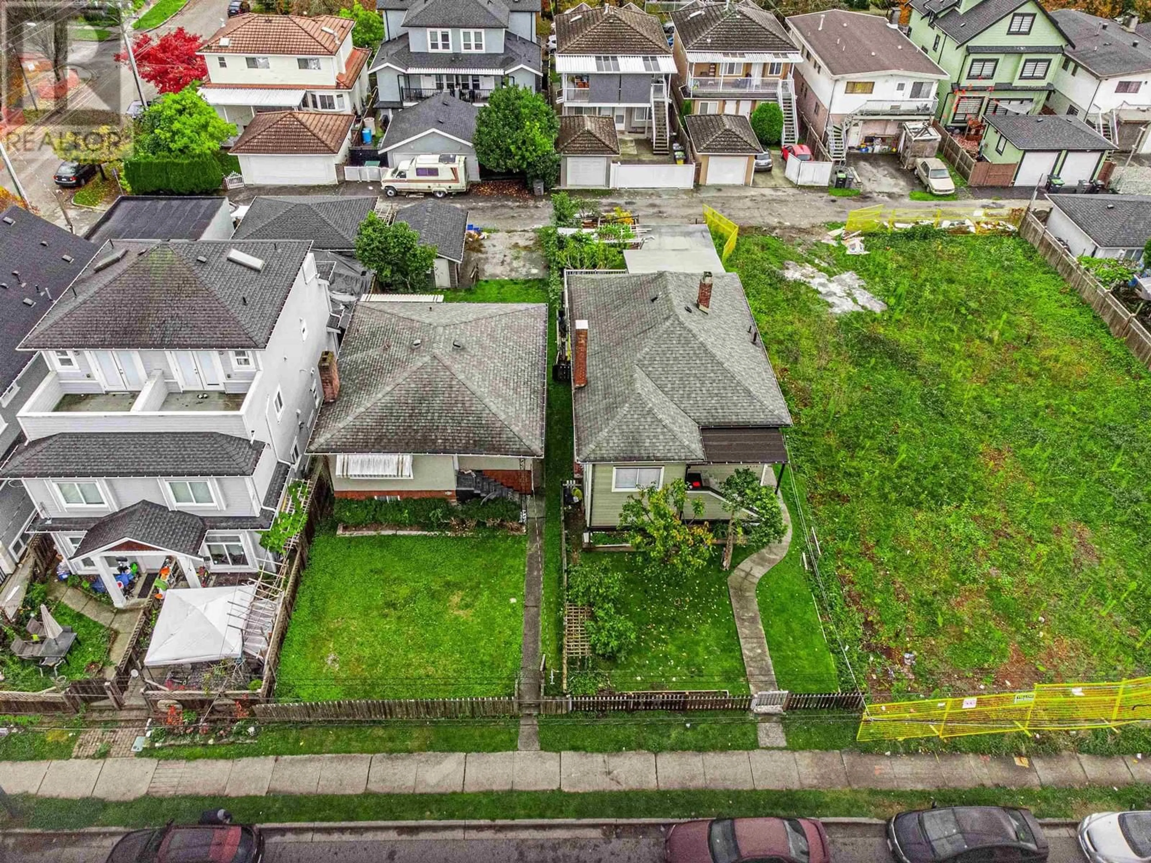 A pic from outside/outdoor area/front of a property/back of a property/a pic from drone, street for 4836 EARLES STREET, Vancouver British Columbia V5R3R5