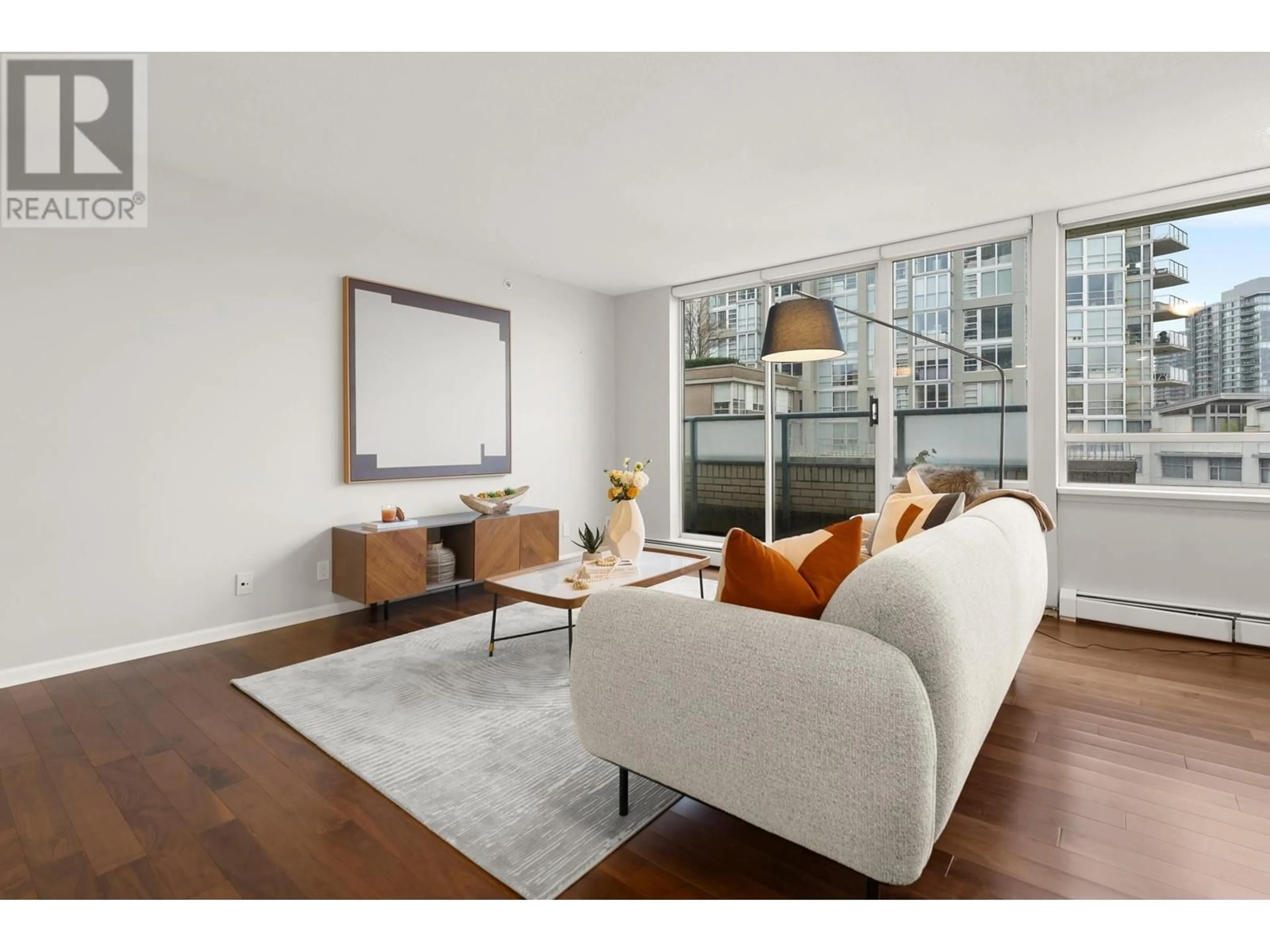 Living room, wood floors for 609 1288 MARINASIDE CRESCENT, Vancouver British Columbia V6Z2W5