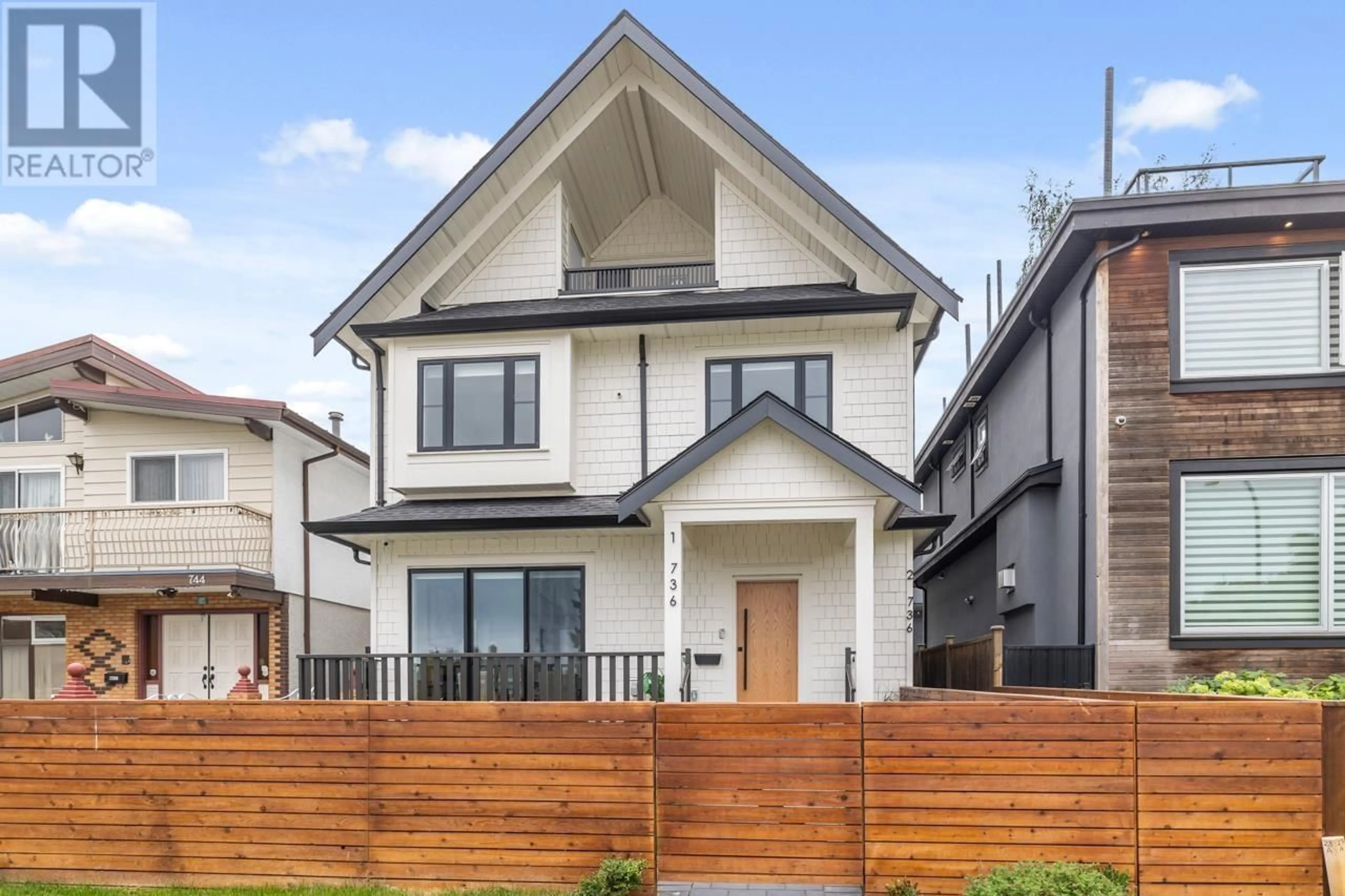 Frontside or backside of a home, the fenced backyard for 1 736 E 32ND AVENUE, Vancouver British Columbia V5V2Y6