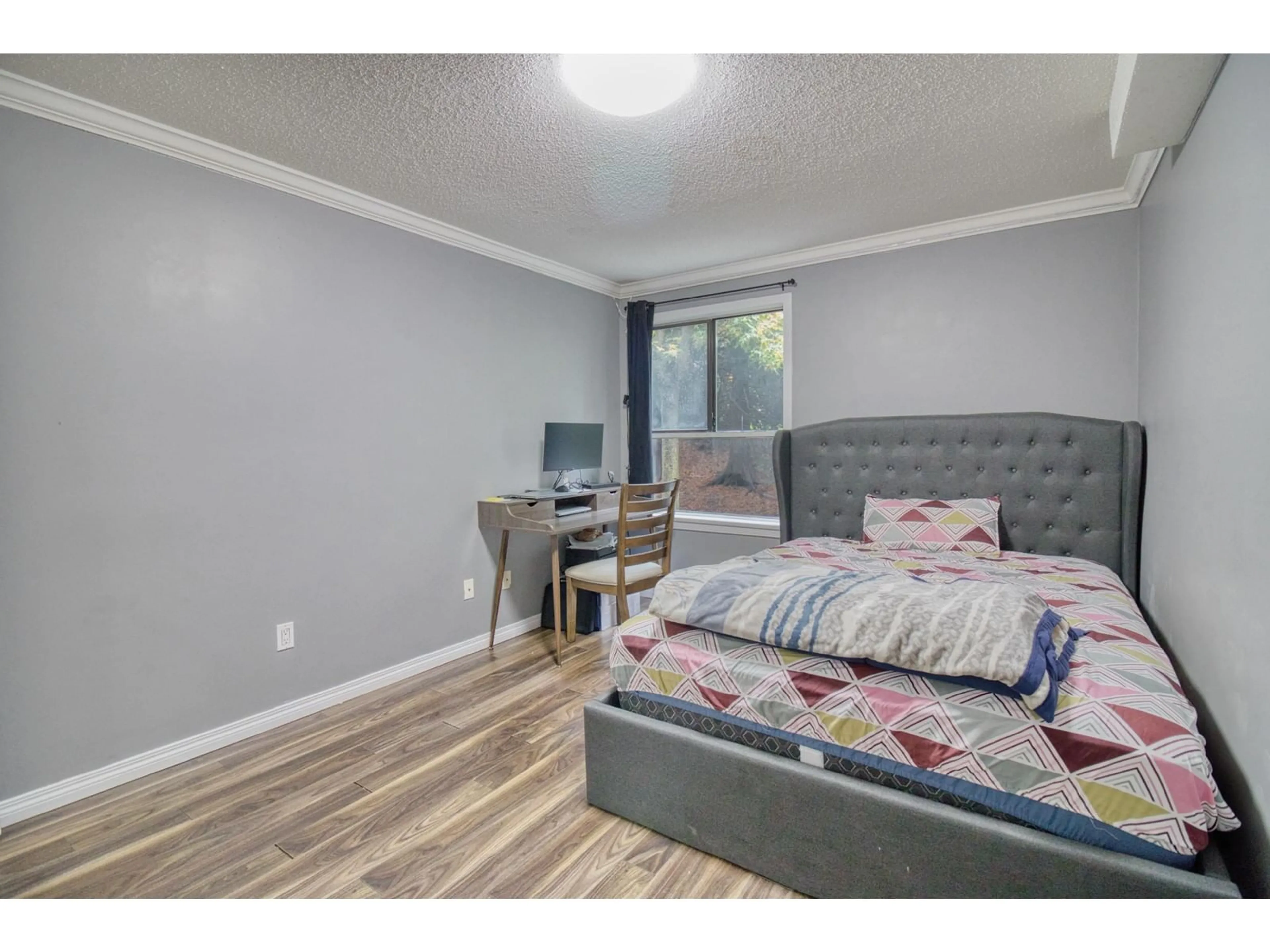 A pic of a room, wood floors for 107 10698 151A STREET, Surrey British Columbia V3R8T5