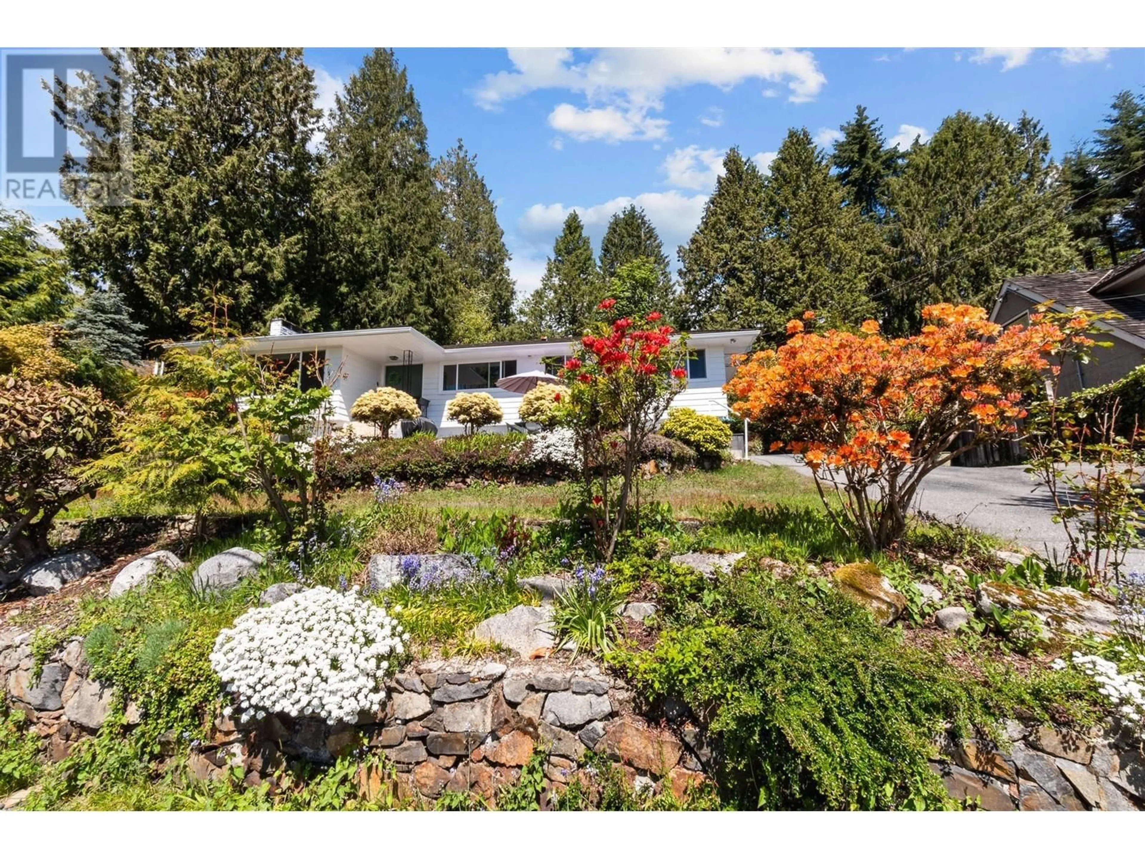 A pic from exterior of the house or condo, the fenced backyard for 1895 ROSEBERY AVENUE, West Vancouver British Columbia V7V2Z5