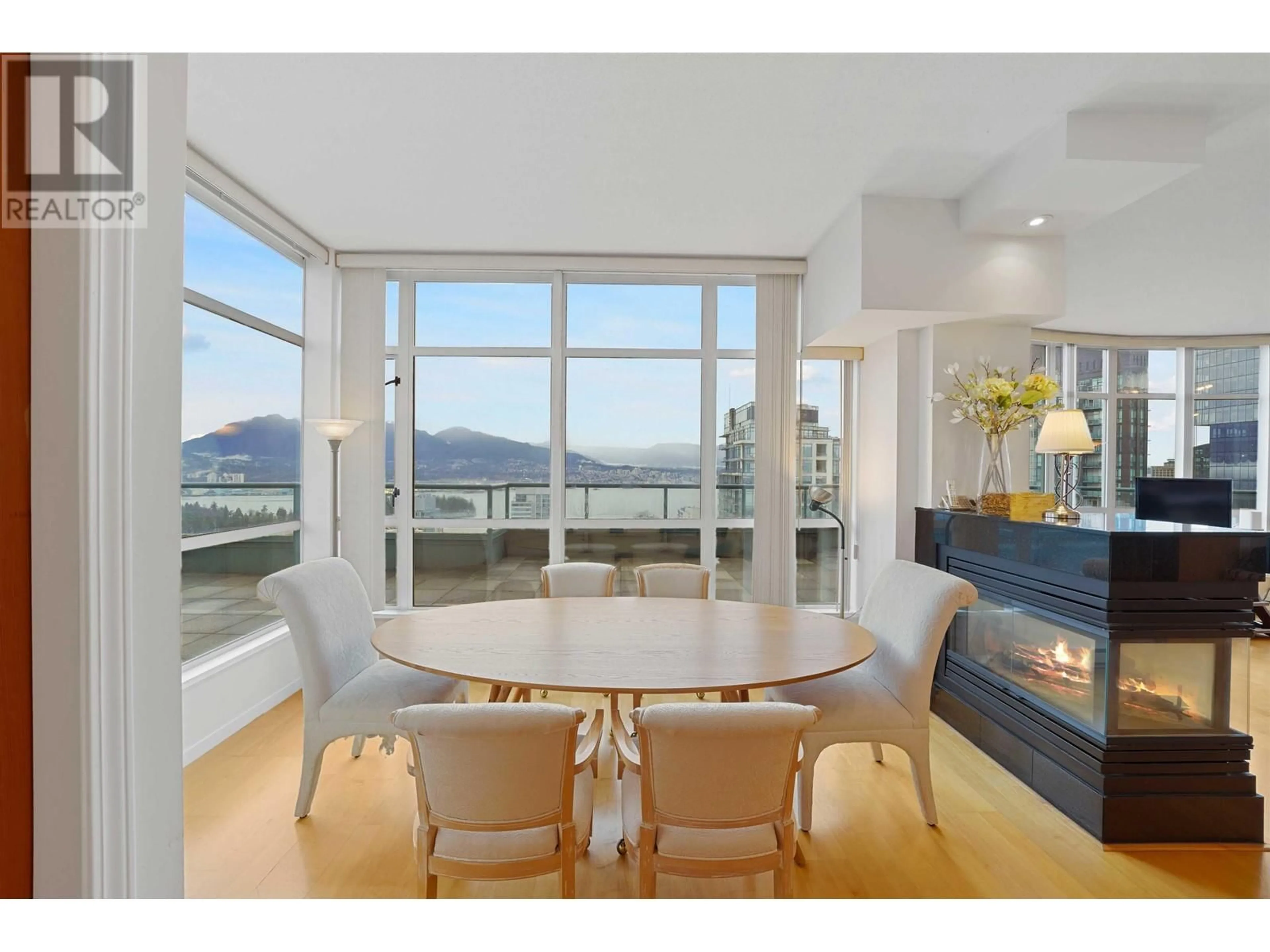 Dining room, wood floors, mountain for 3402 1239 W GEORGIA STREET, Vancouver British Columbia V6E4R8