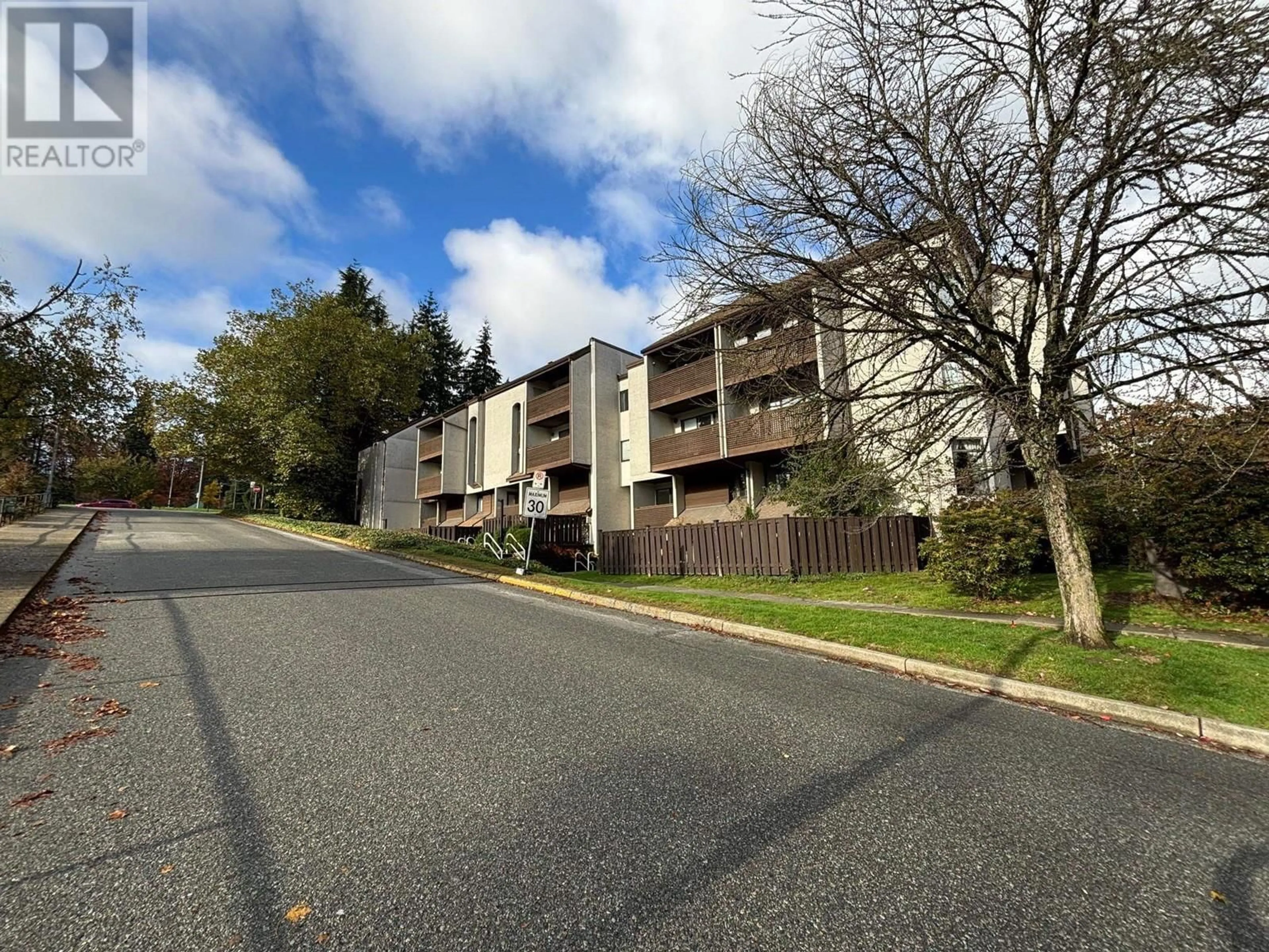 A pic from exterior of the house or condo, the street view for 410 340 GINGER DRIVE, New Westminster British Columbia V3L5L7