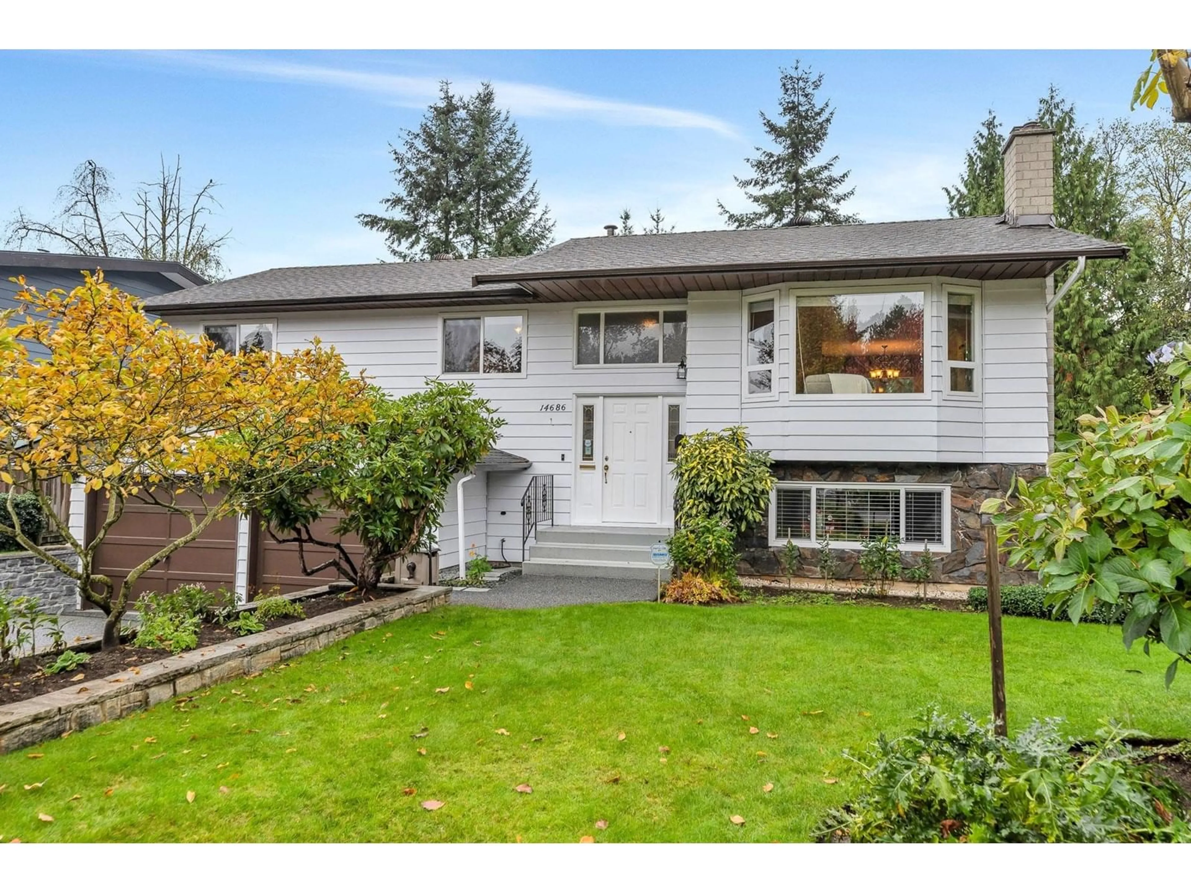 Frontside or backside of a home, the fenced backyard for 14686 89 AVENUE, Surrey British Columbia V3R6S8