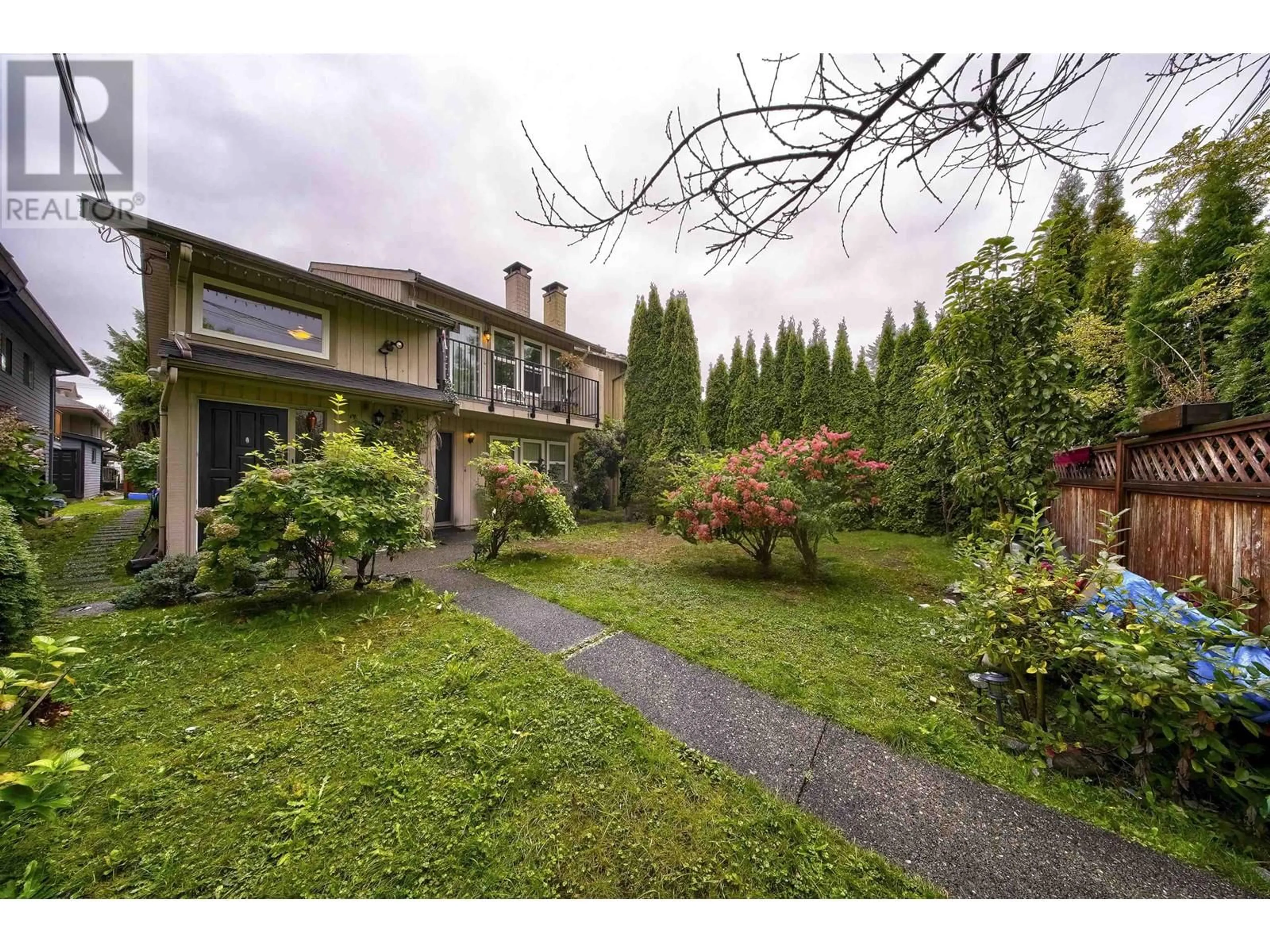 Frontside or backside of a home, the fenced backyard for 1671 GARDEN AVENUE, North Vancouver British Columbia V7P3A6