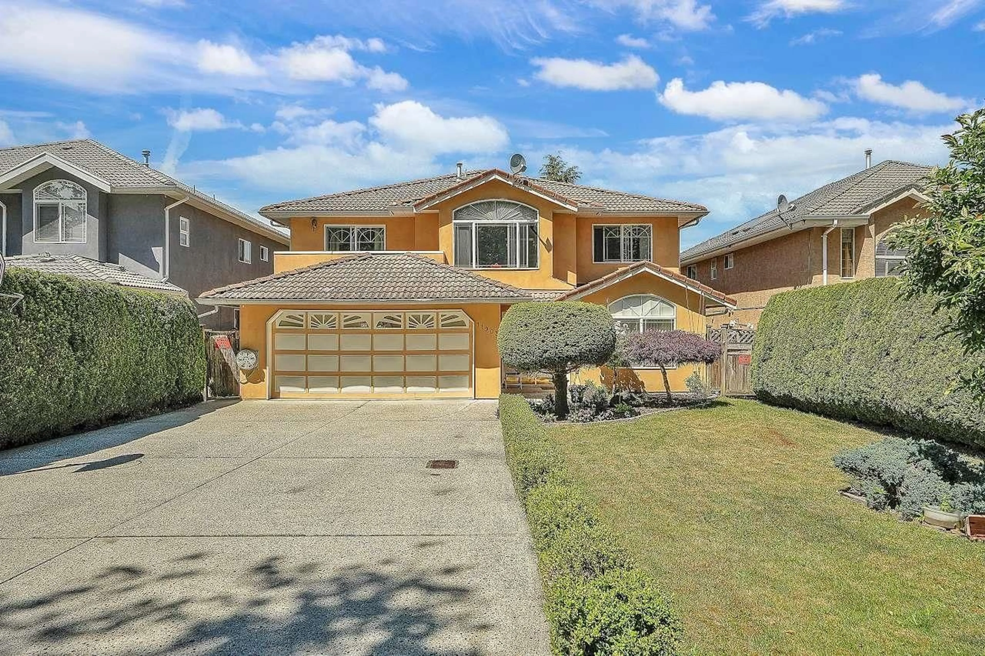 Frontside or backside of a home, the street view for 11903 98 AVENUE, Surrey British Columbia V3V8B3