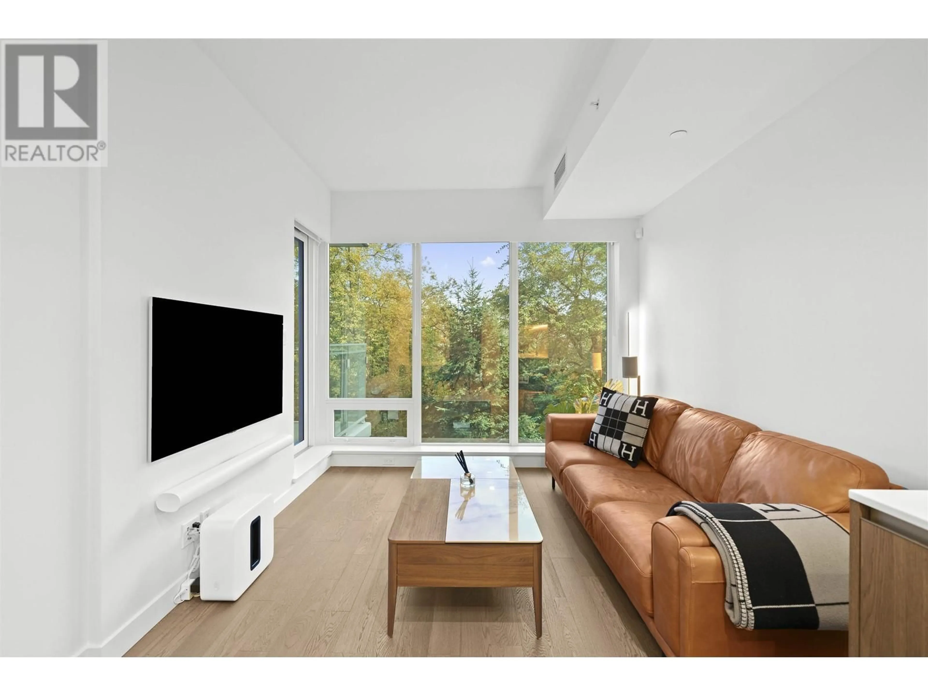 Living room, wood floors for 207 6833 PEARSON WAY, Richmond British Columbia V7C0E8