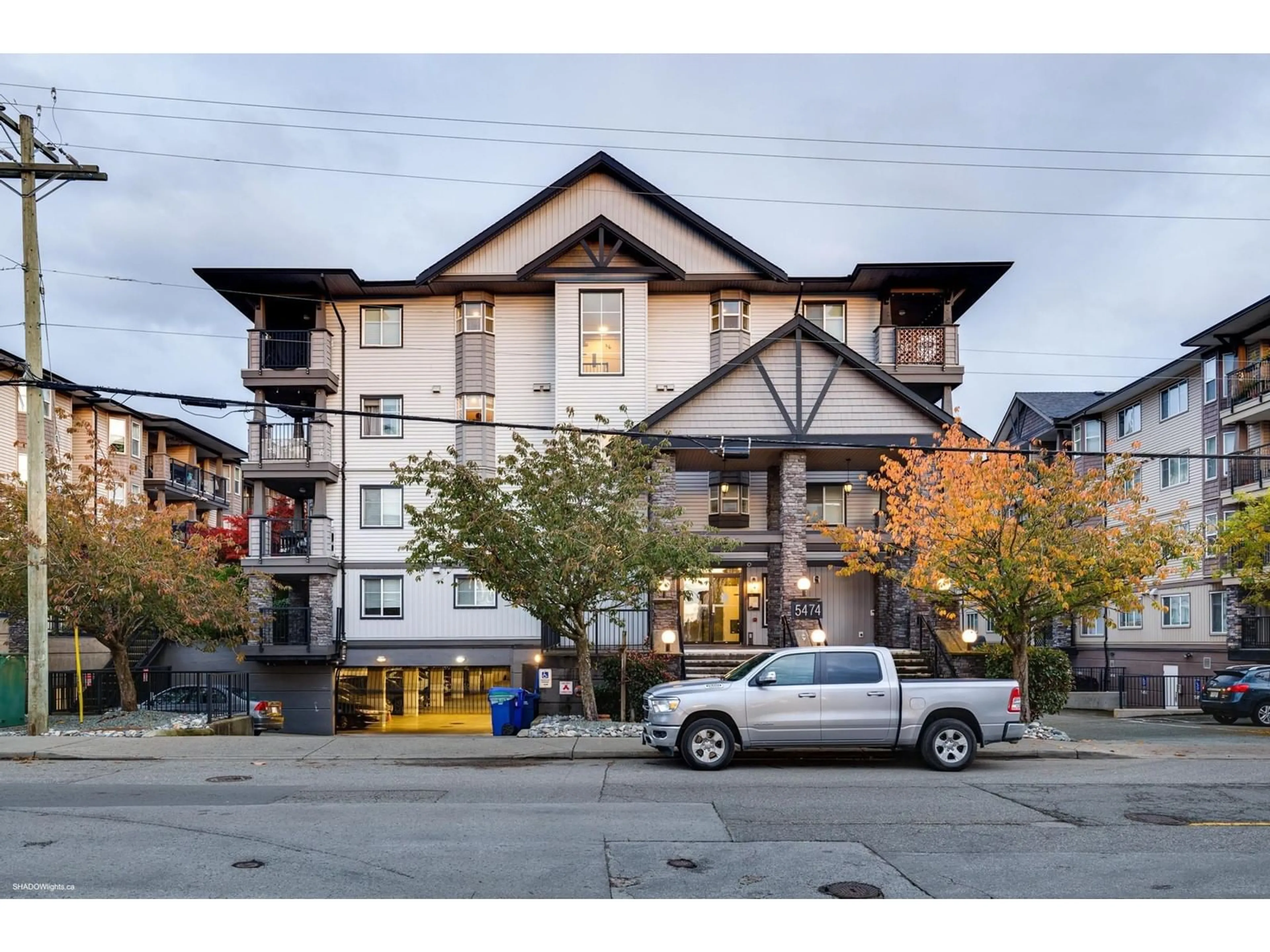 A pic from exterior of the house or condo, the street view for 405 5474 198 STREET, Langley British Columbia V3A1G2