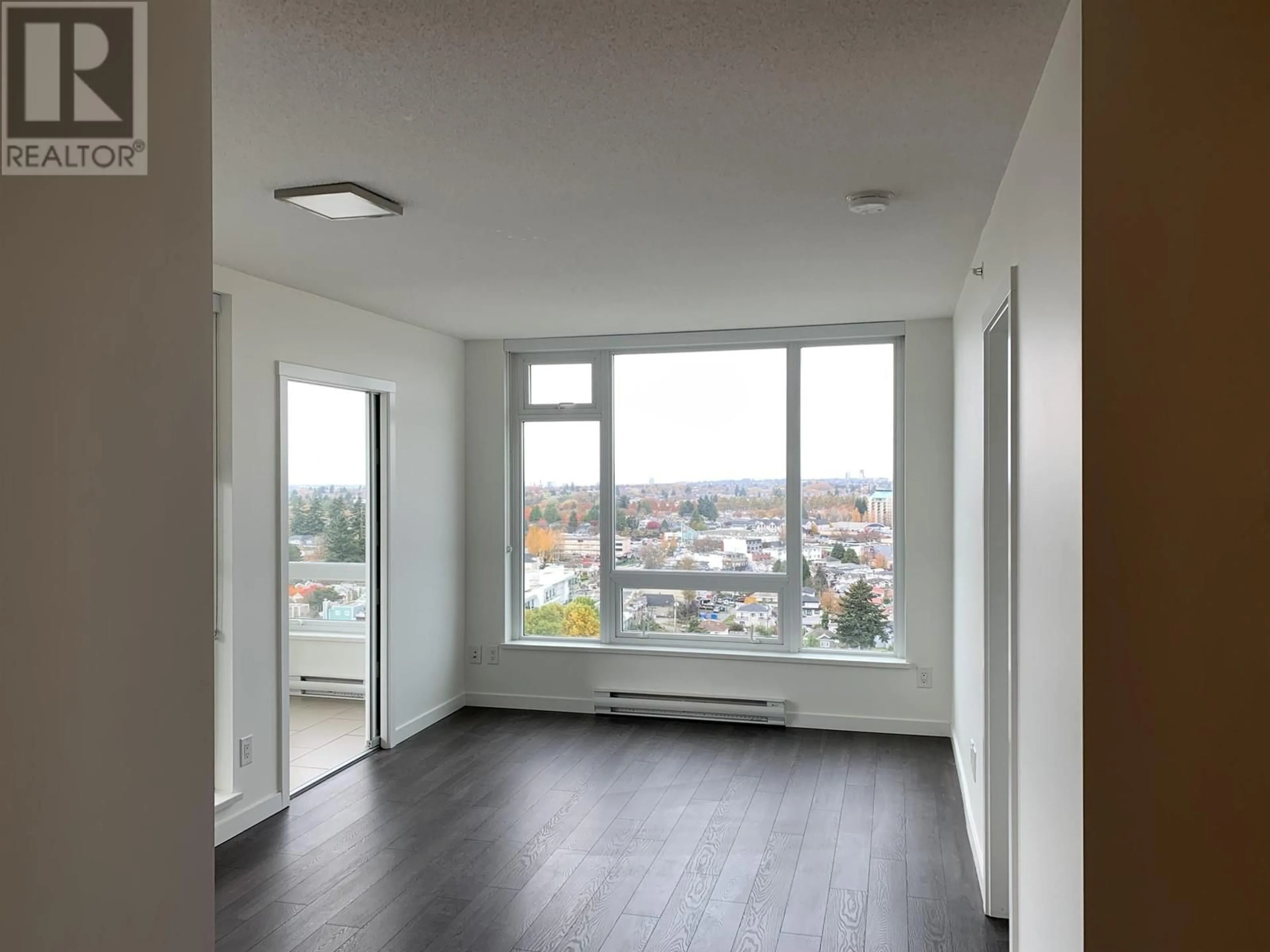 A pic of a room, wood floors for 2209 5665 BOUNDARY ROAD, Vancouver British Columbia V5R0E4