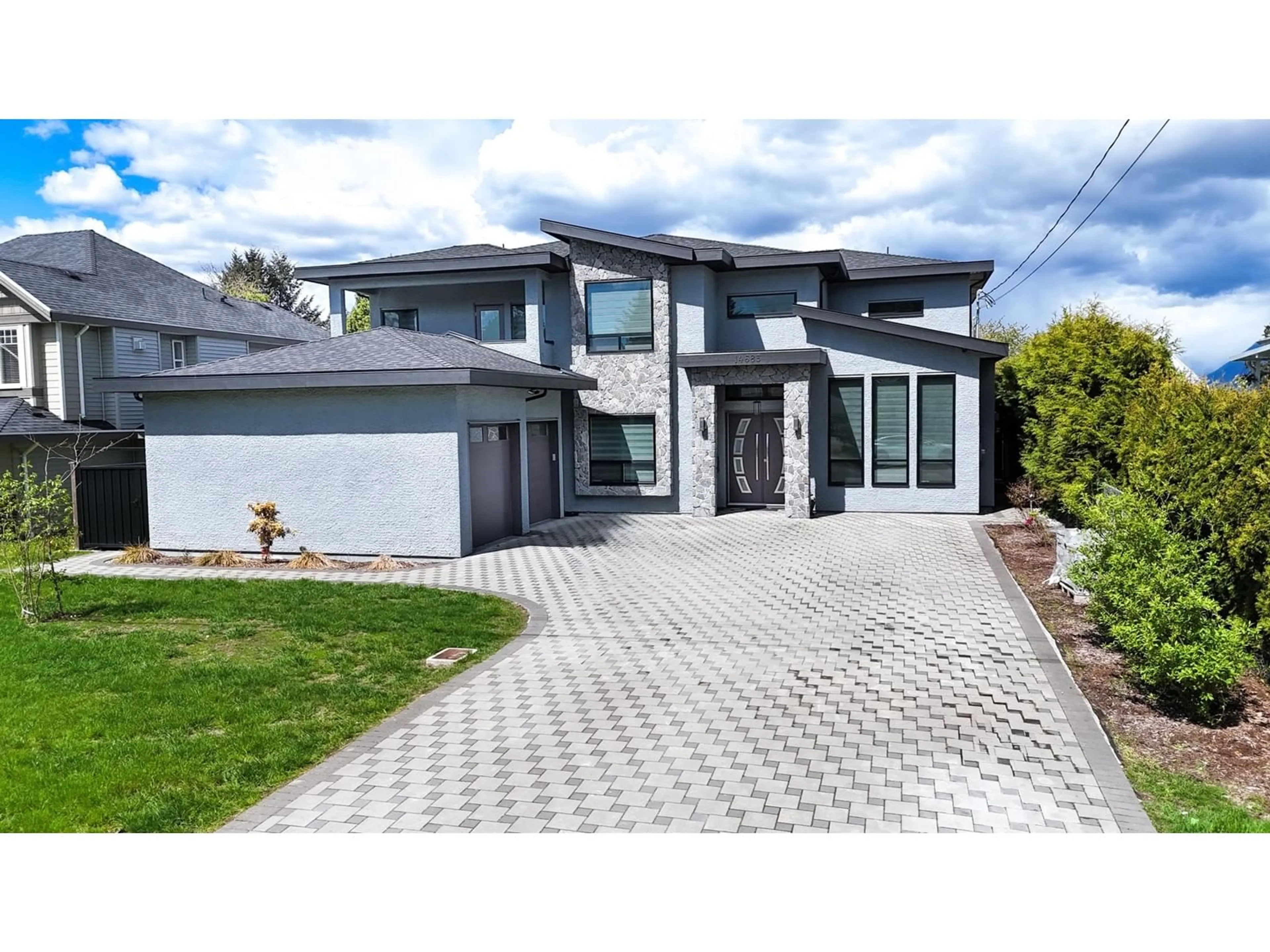 Frontside or backside of a home, the street view for 14685 110A AVE AVENUE, Surrey British Columbia V3R2B6