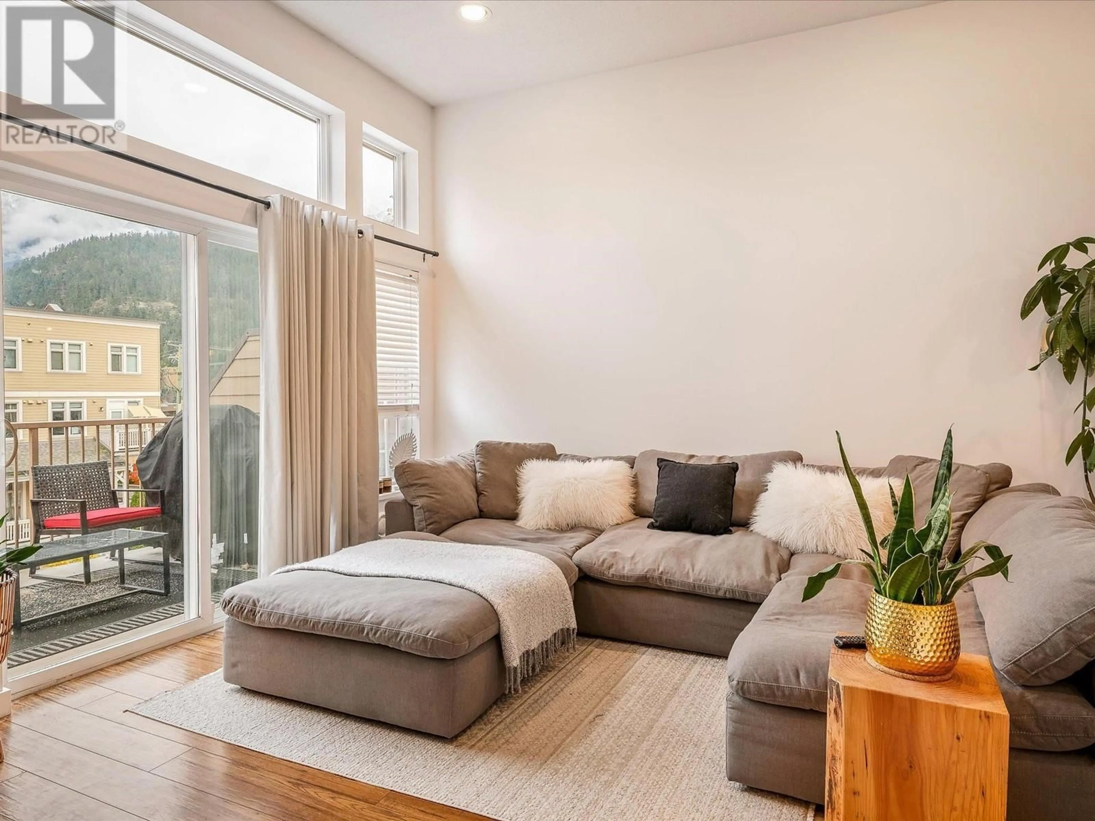 Living room, wood floors for 301 7331 ARBUTUS STREET, Pemberton British Columbia V0N2L1