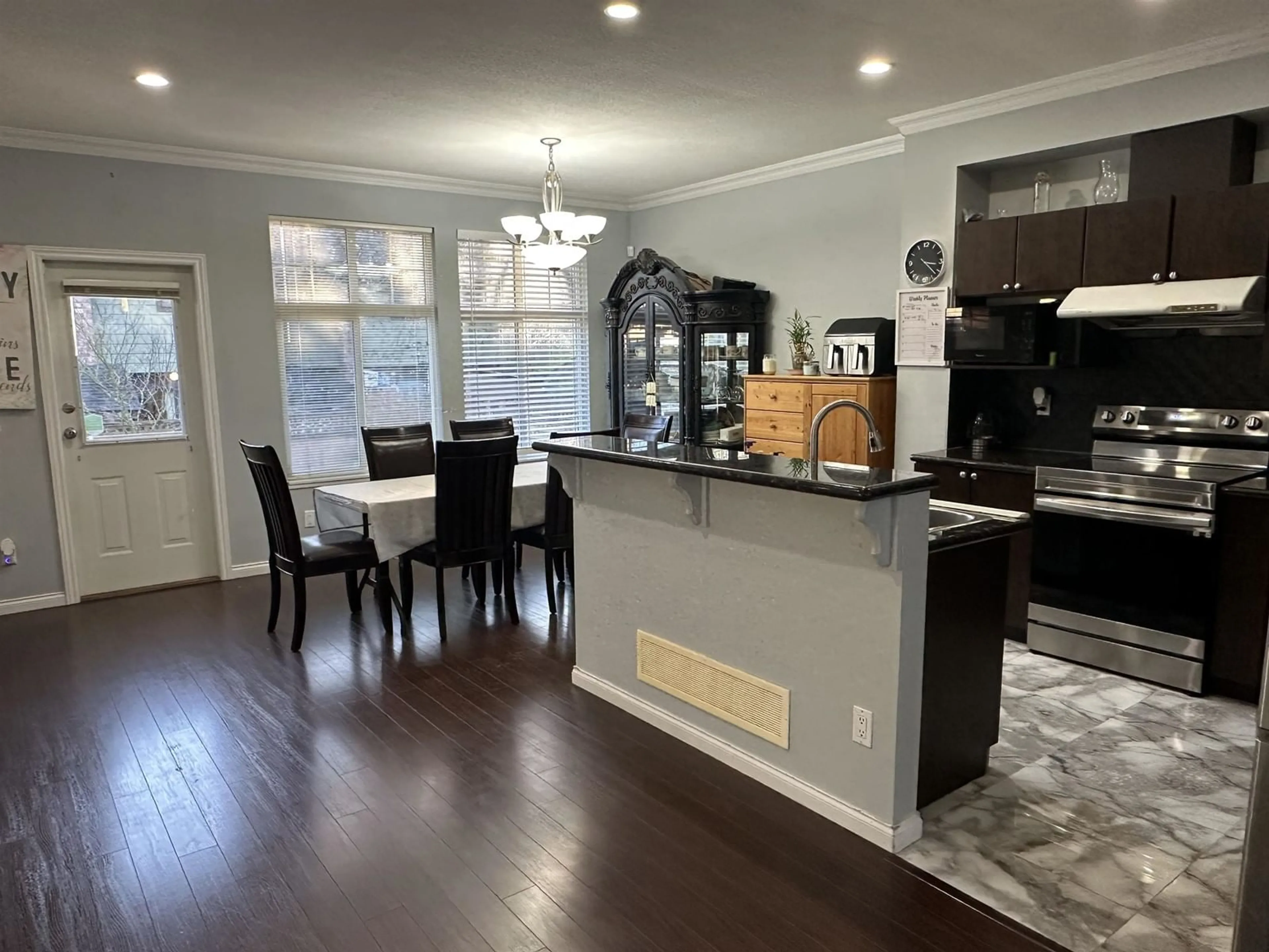 Open concept kitchen, wood/laminate floor for 16 7518 138 STREET, Surrey British Columbia V3W1S1