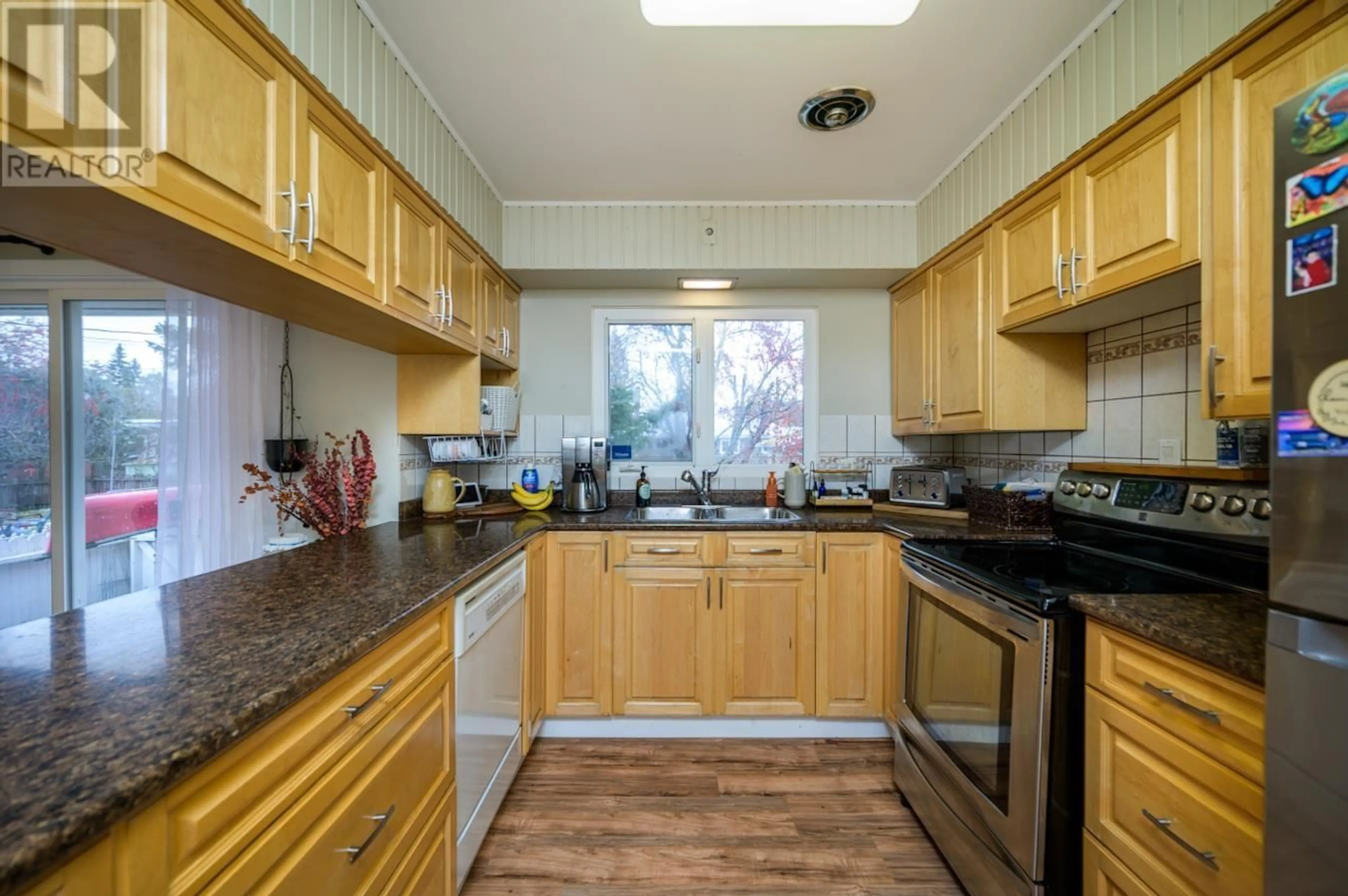 Standard kitchen, wood floors, cottage for 3032 1ST AVENUE, Prince George British Columbia V2M1B9