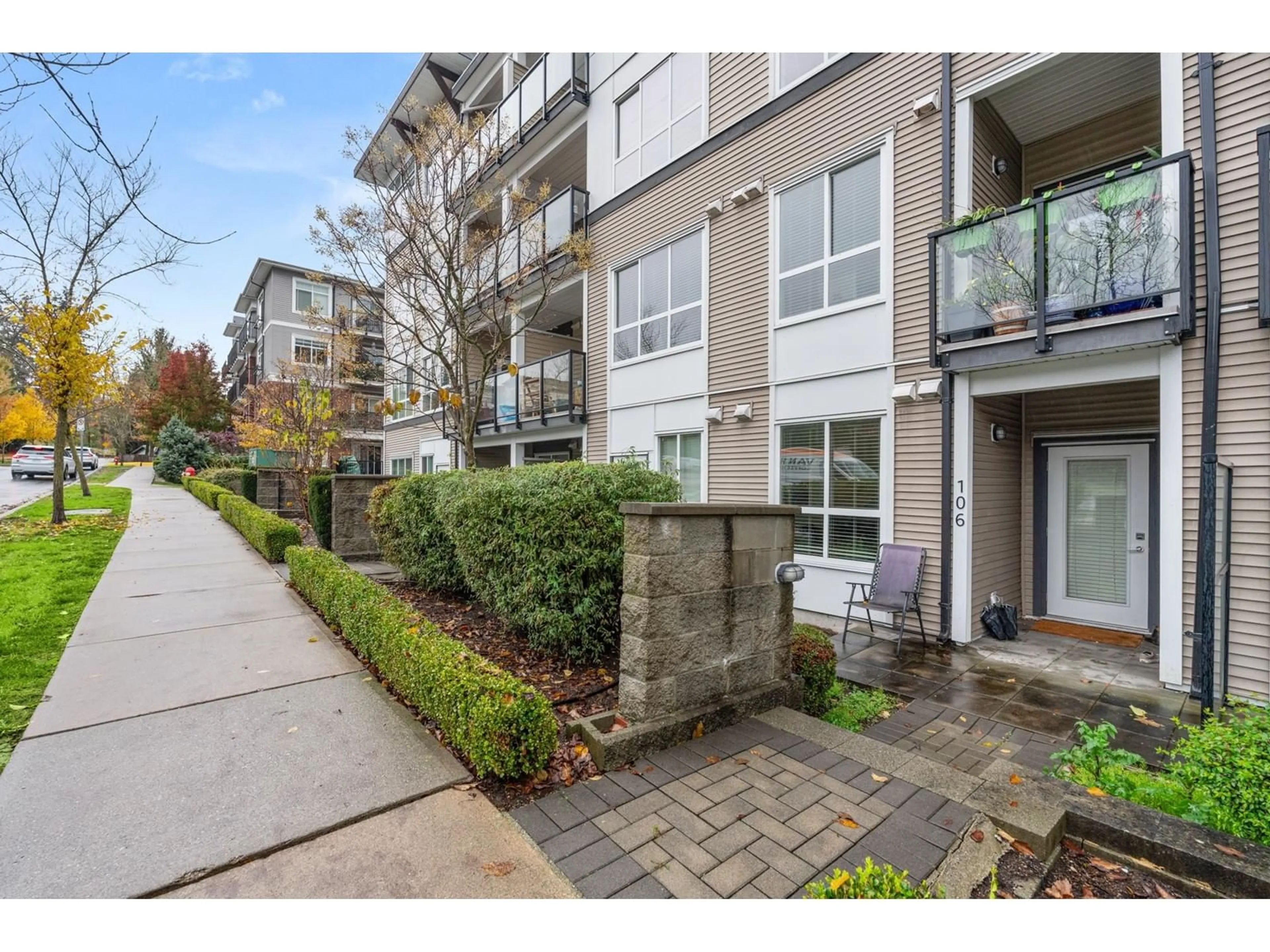 A pic from exterior of the house or condo, the street view for 106 6468 195A STREET, Surrey British Columbia V4N6R6