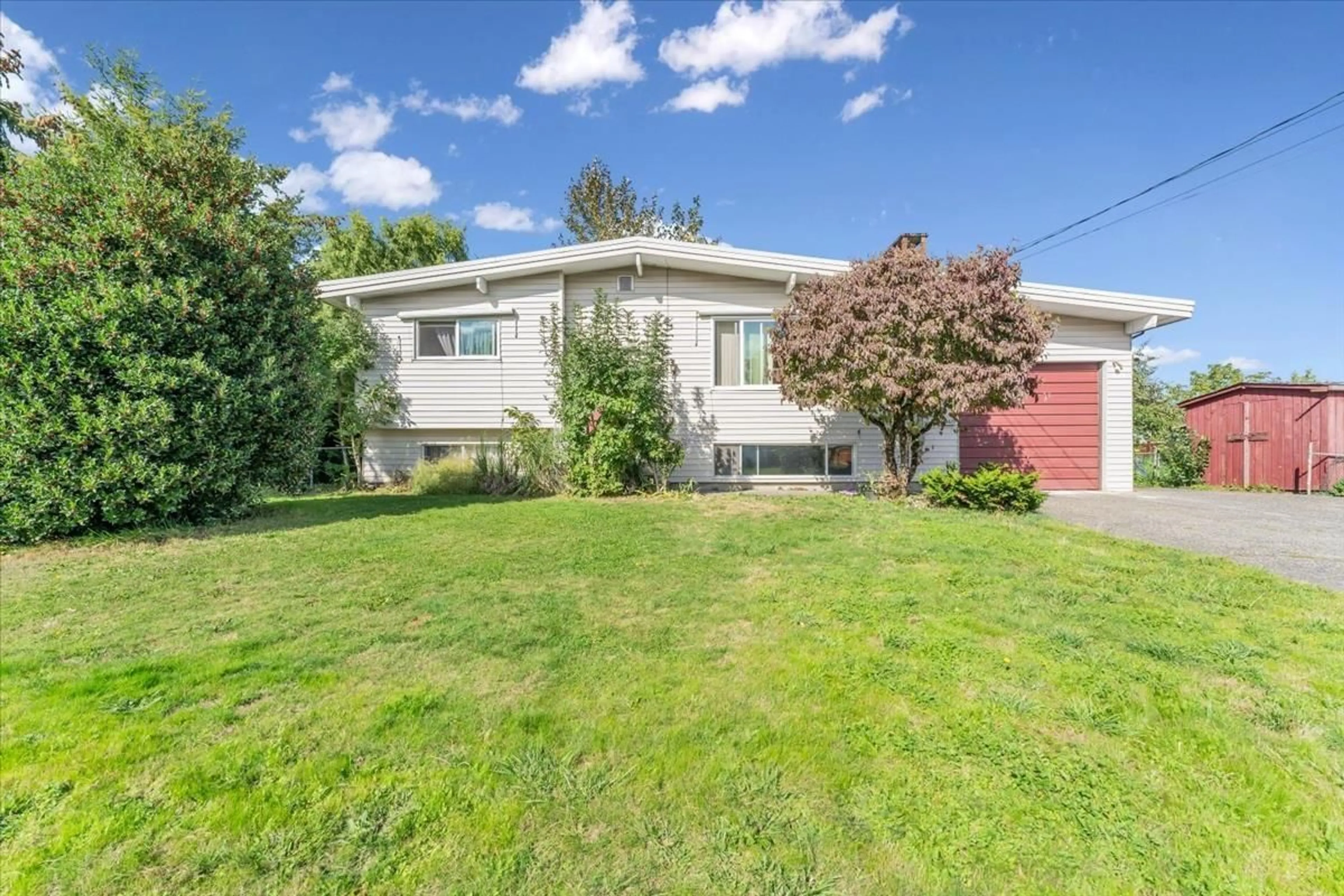 Frontside or backside of a home, the fenced backyard for 45273 BALMORAL AVENUE, Chilliwack British Columbia V2R3G9