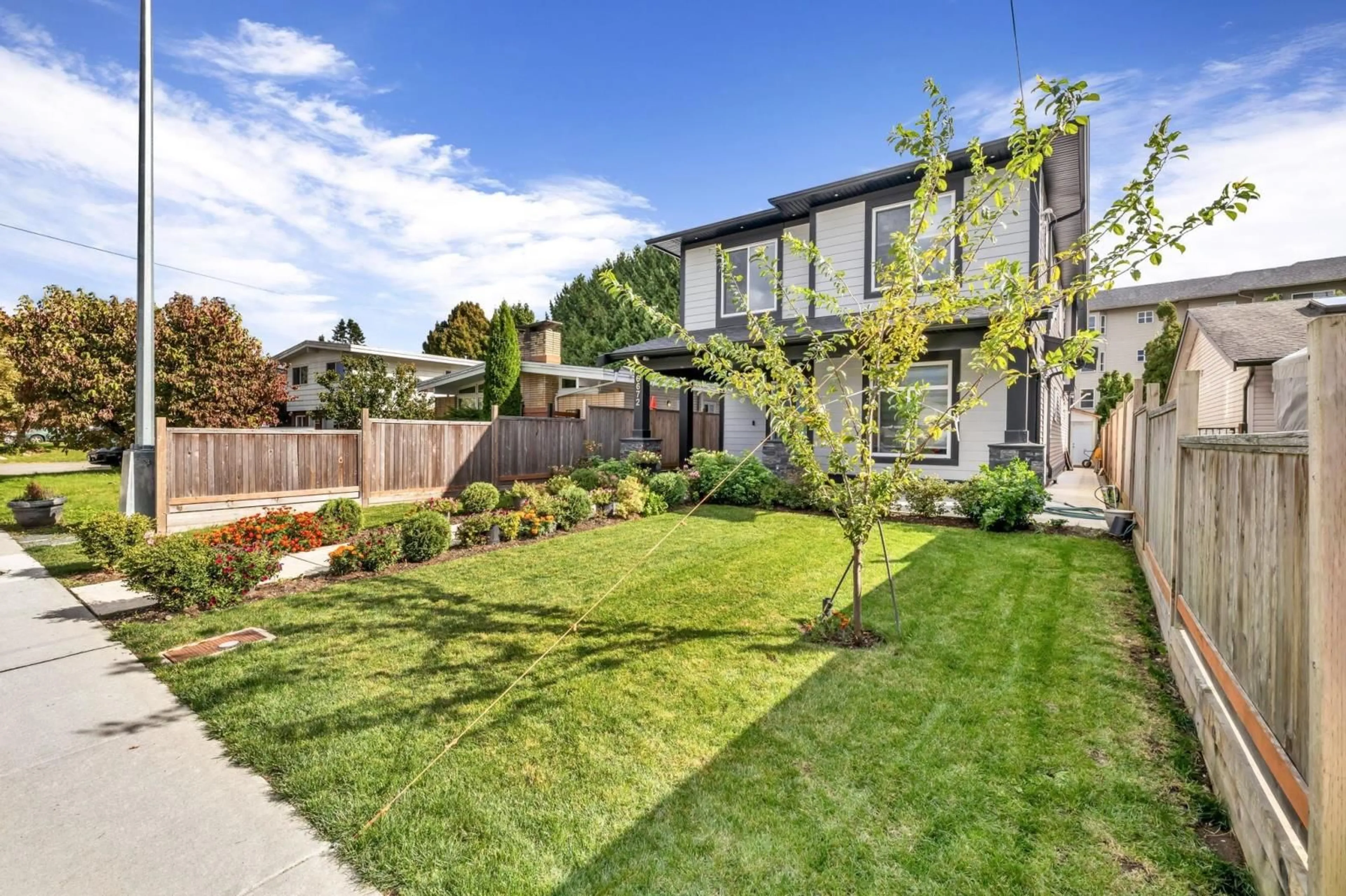 Frontside or backside of a home, the fenced backyard for 46672 MACKEN AVENUE, Chilliwack British Columbia V2P3B8