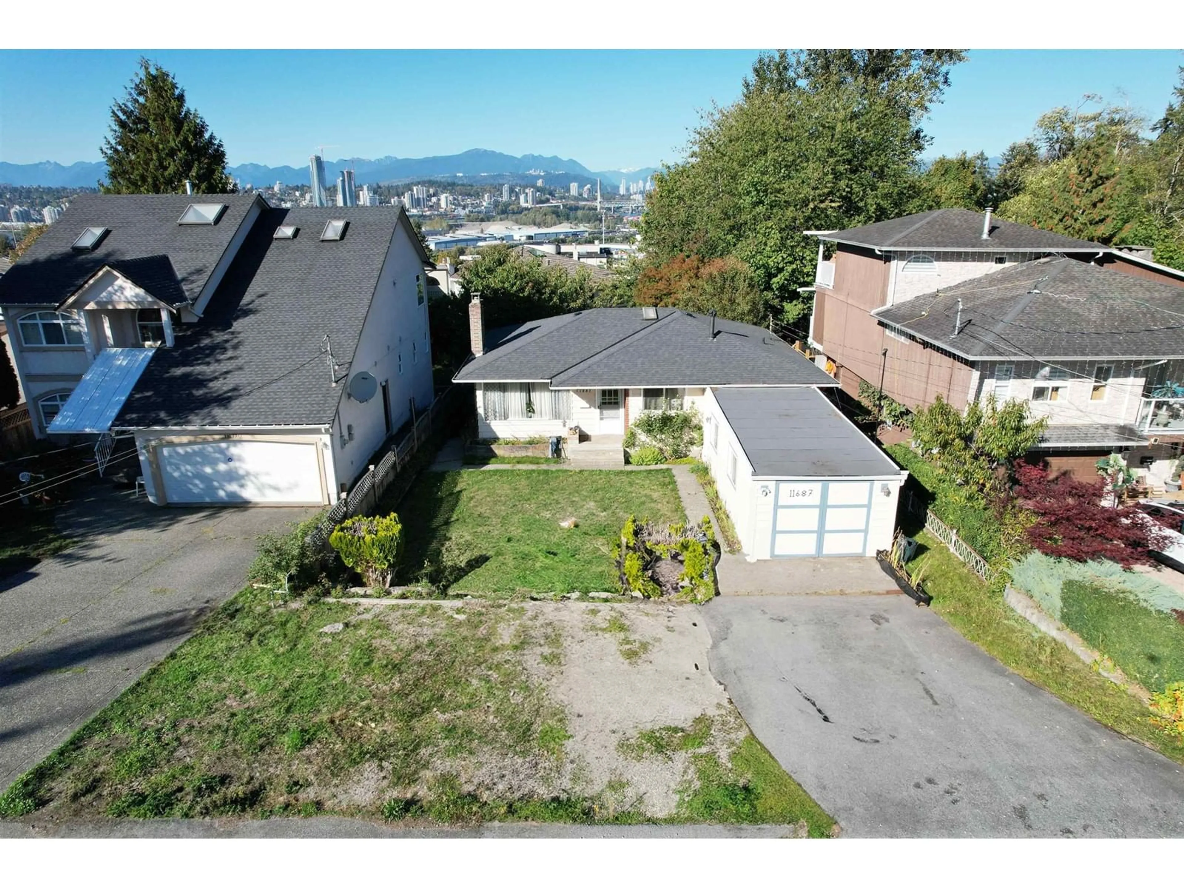 Frontside or backside of a home, the street view for 11687 98A AVENUE, Surrey British Columbia V3V2L1