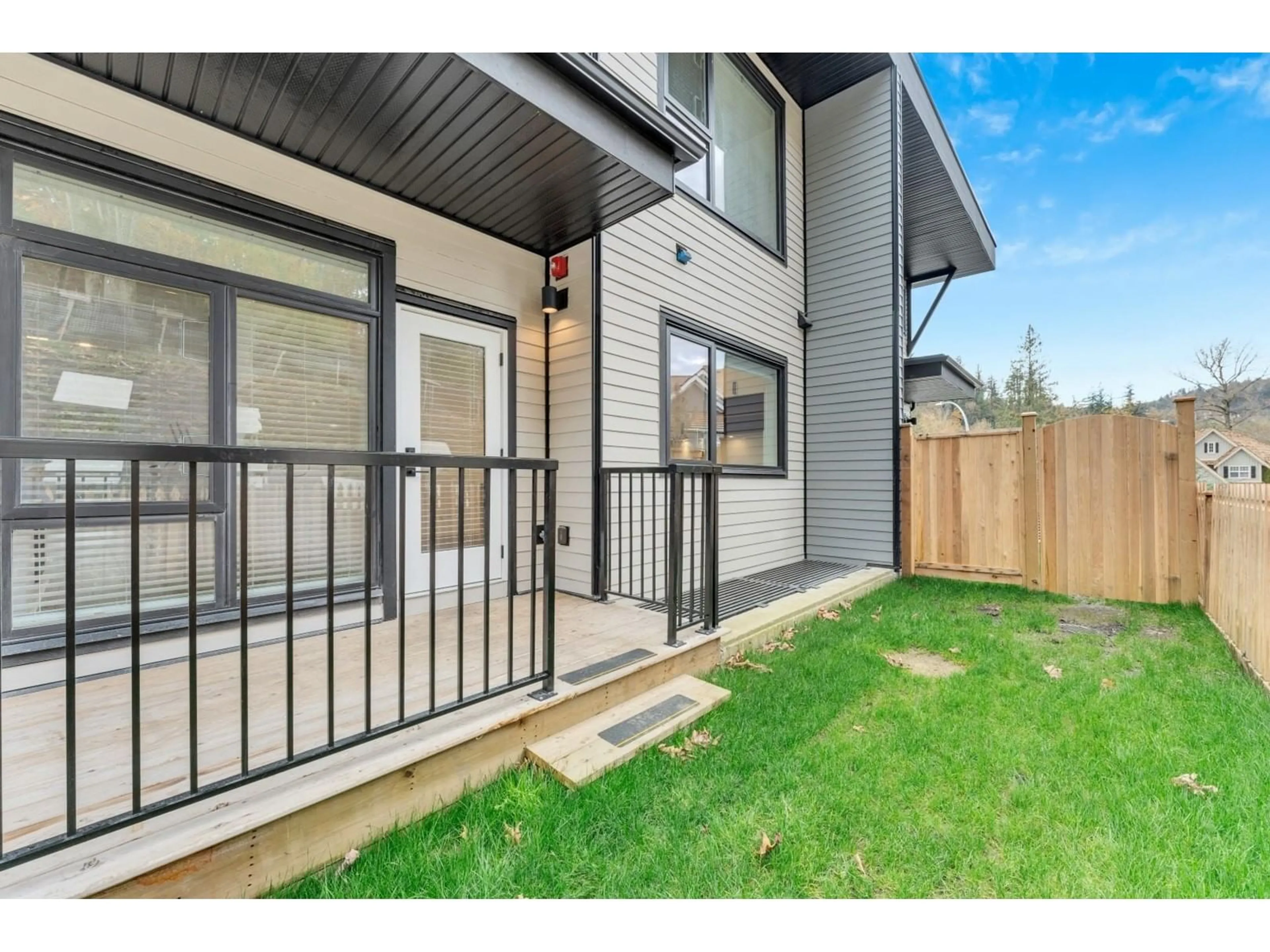 A pic from exterior of the house or condo, the fenced backyard for 15 35706 MARSHALL ROAD, Abbotsford British Columbia N0N0N0