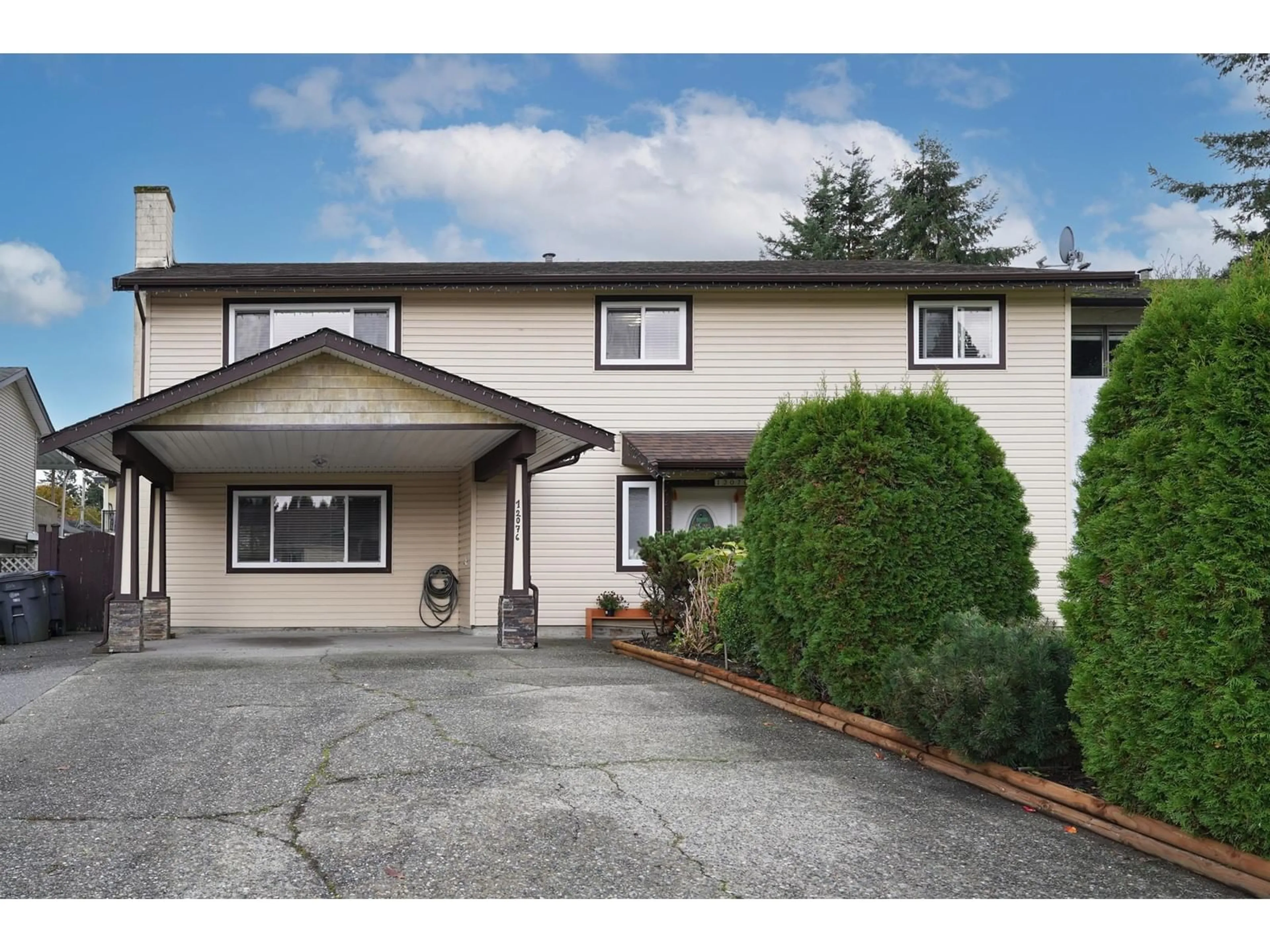 Home with vinyl exterior material, street for 12076 84A, Surrey British Columbia V3W8L7