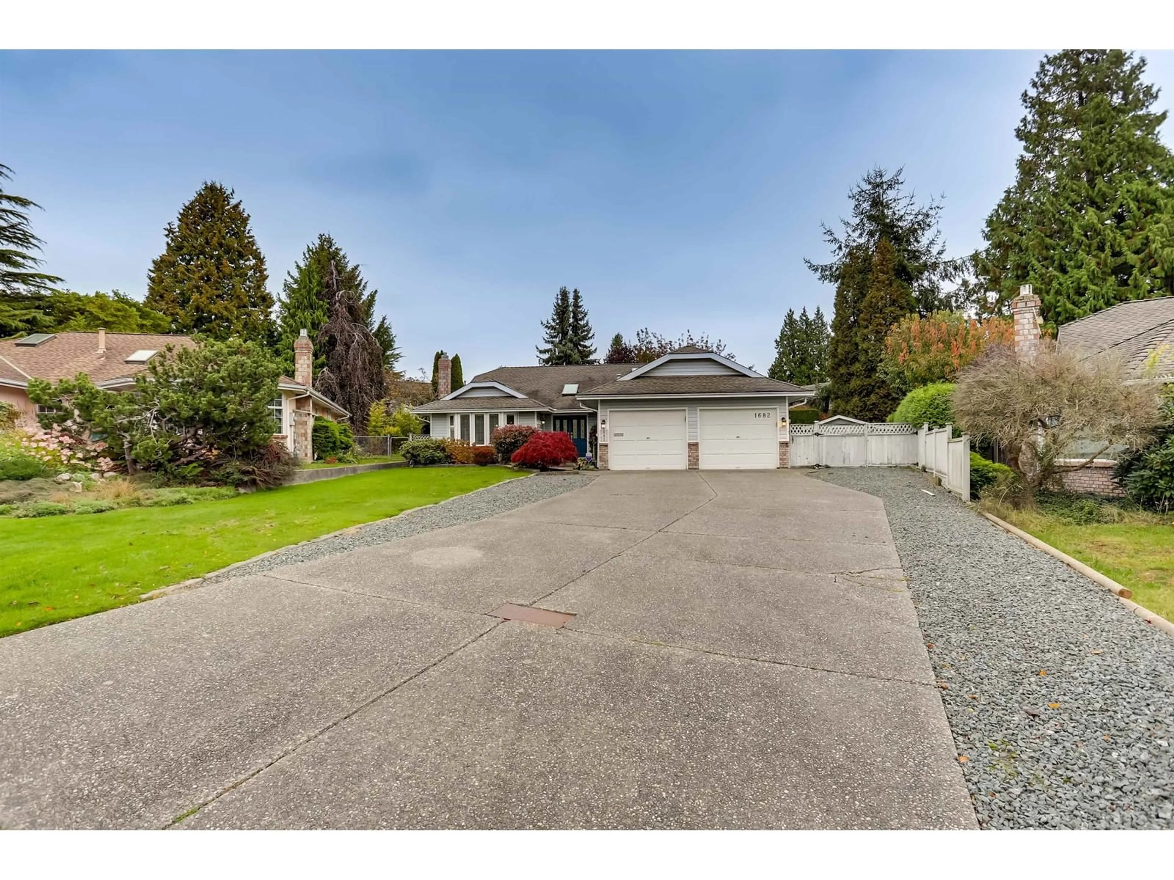 Frontside or backside of a home, the fenced backyard for 1682 141A STREET, Surrey British Columbia V4A8K2